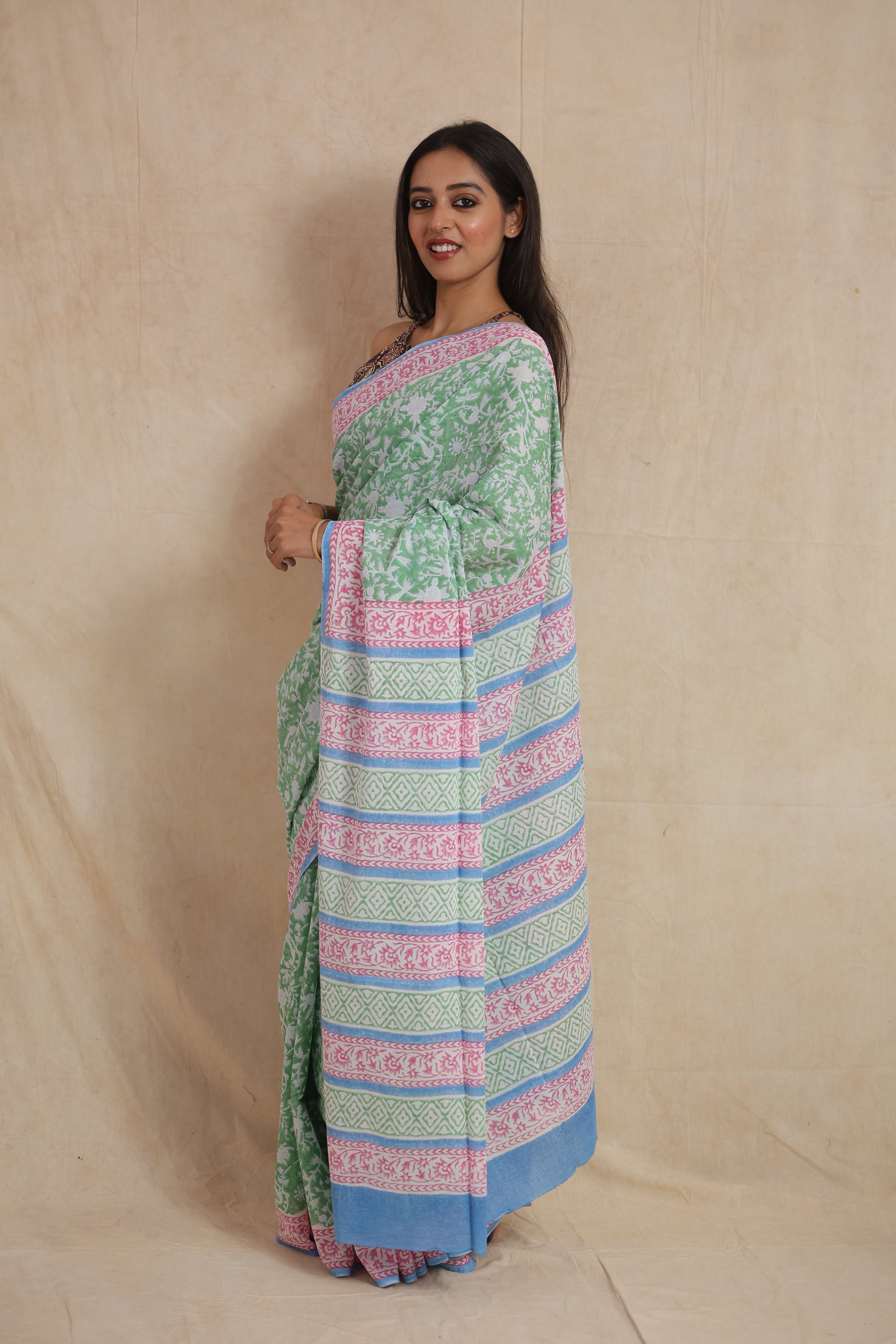 Side profile of mint green Sanghnaree cotton saree with printed pallu