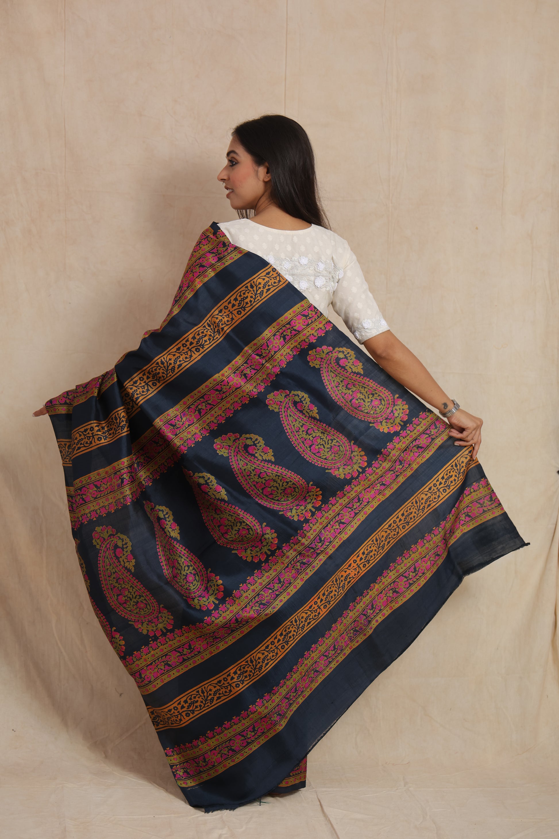 Back view of navy blue Batik silk saree with paisley printed pallu