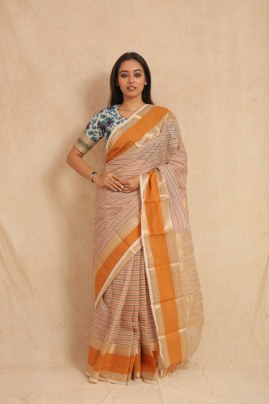 Off white Kanchipuram cotton saree with orange border front view