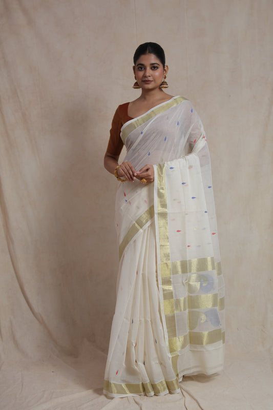 Full view of off white Kanchipuram cotton saree with colorful woven motifs