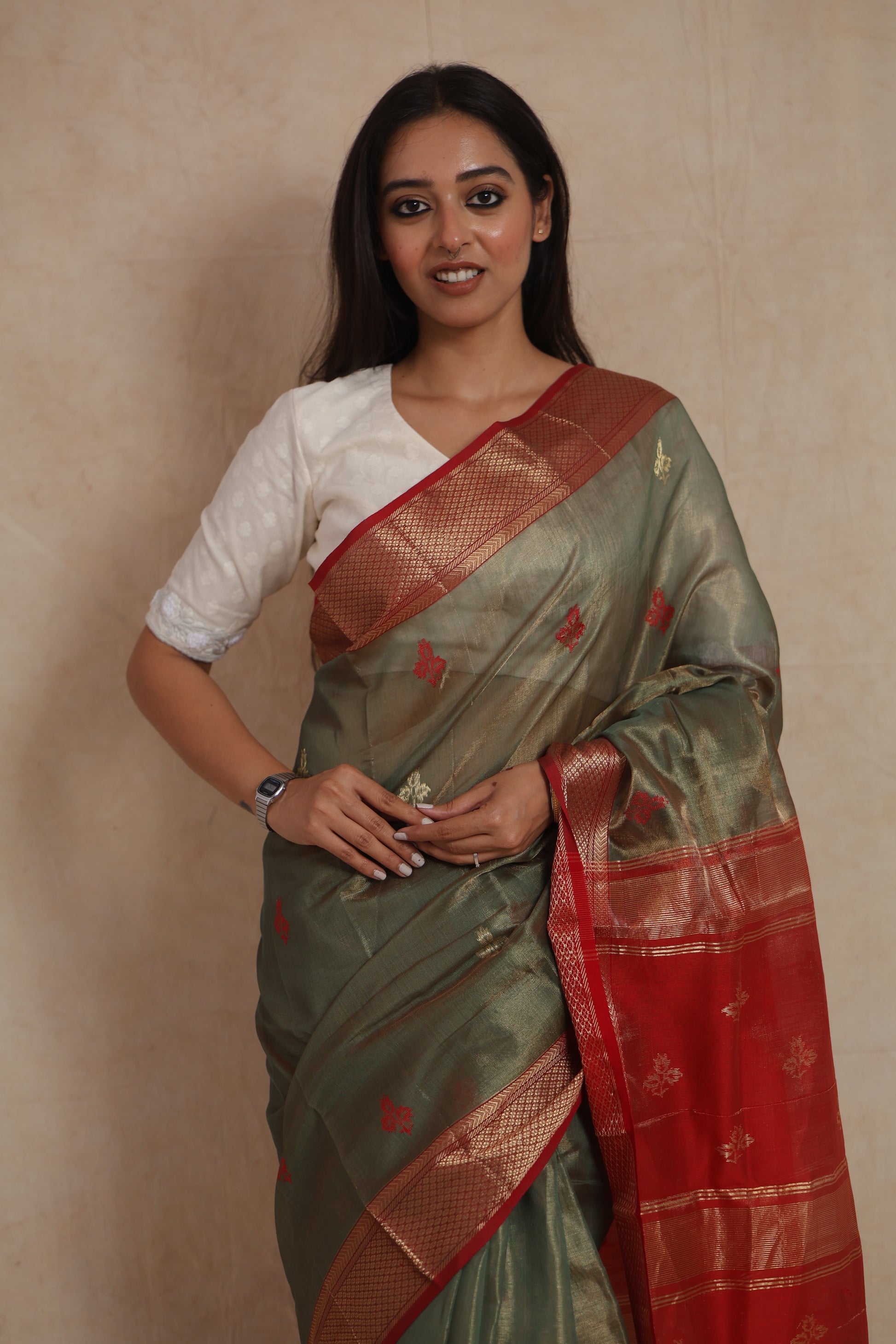Olive green Maheshwari handloom silk cotton saree with red contrast pallu and woven zari border