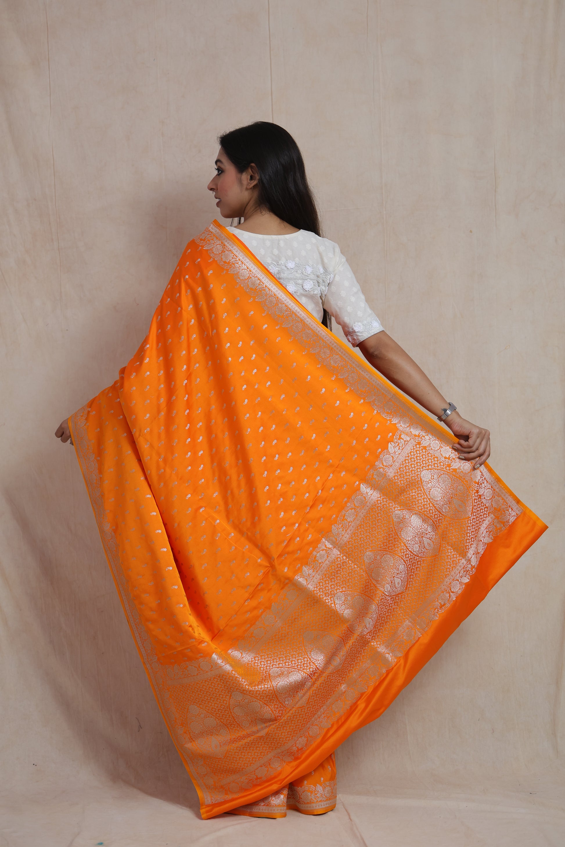 Back view of Banarasi silk saree displaying richly woven traditional pallu and border