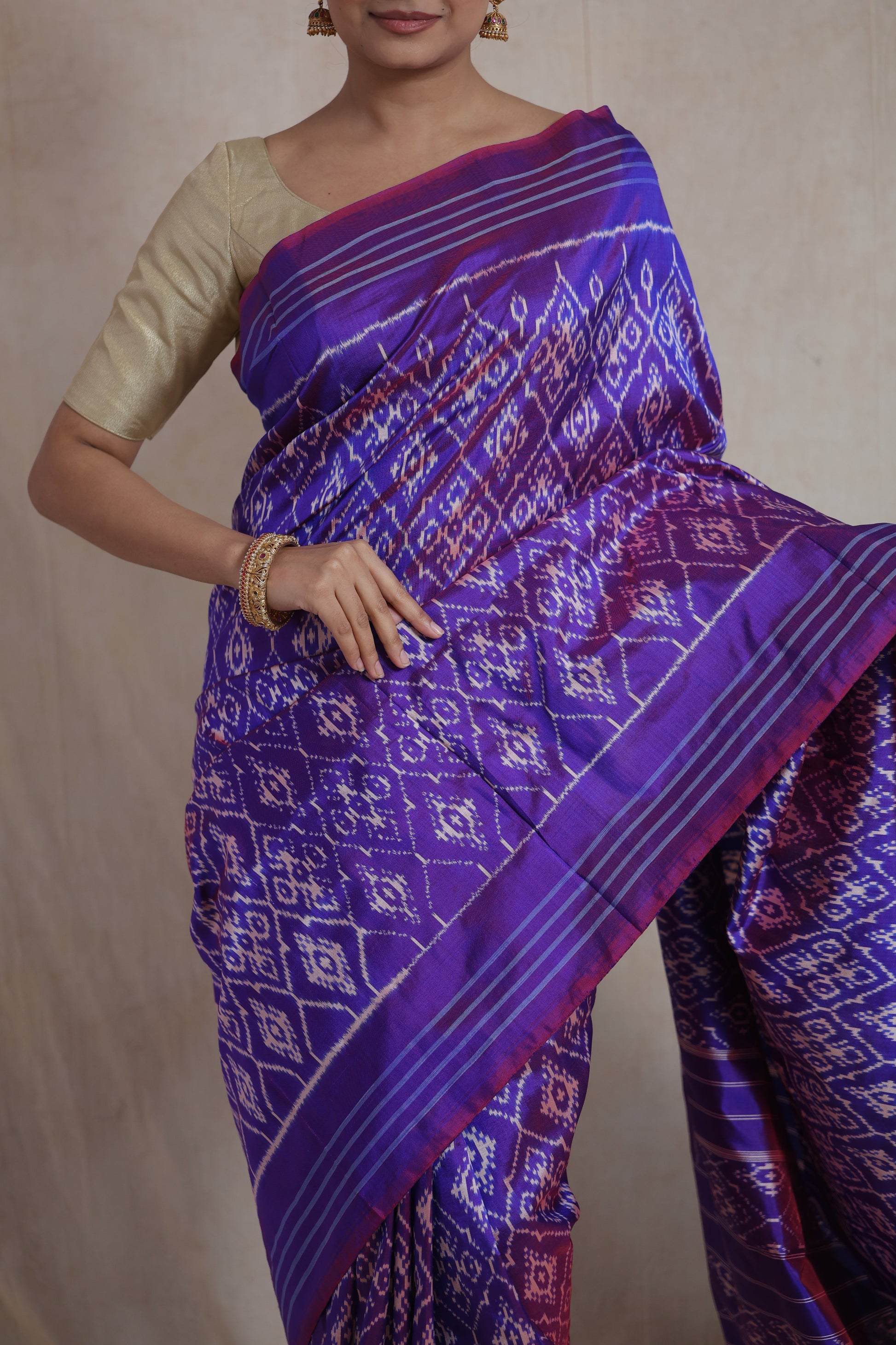 Close-up of royal purple Panchampali silk saree with geometric Ikat patterns