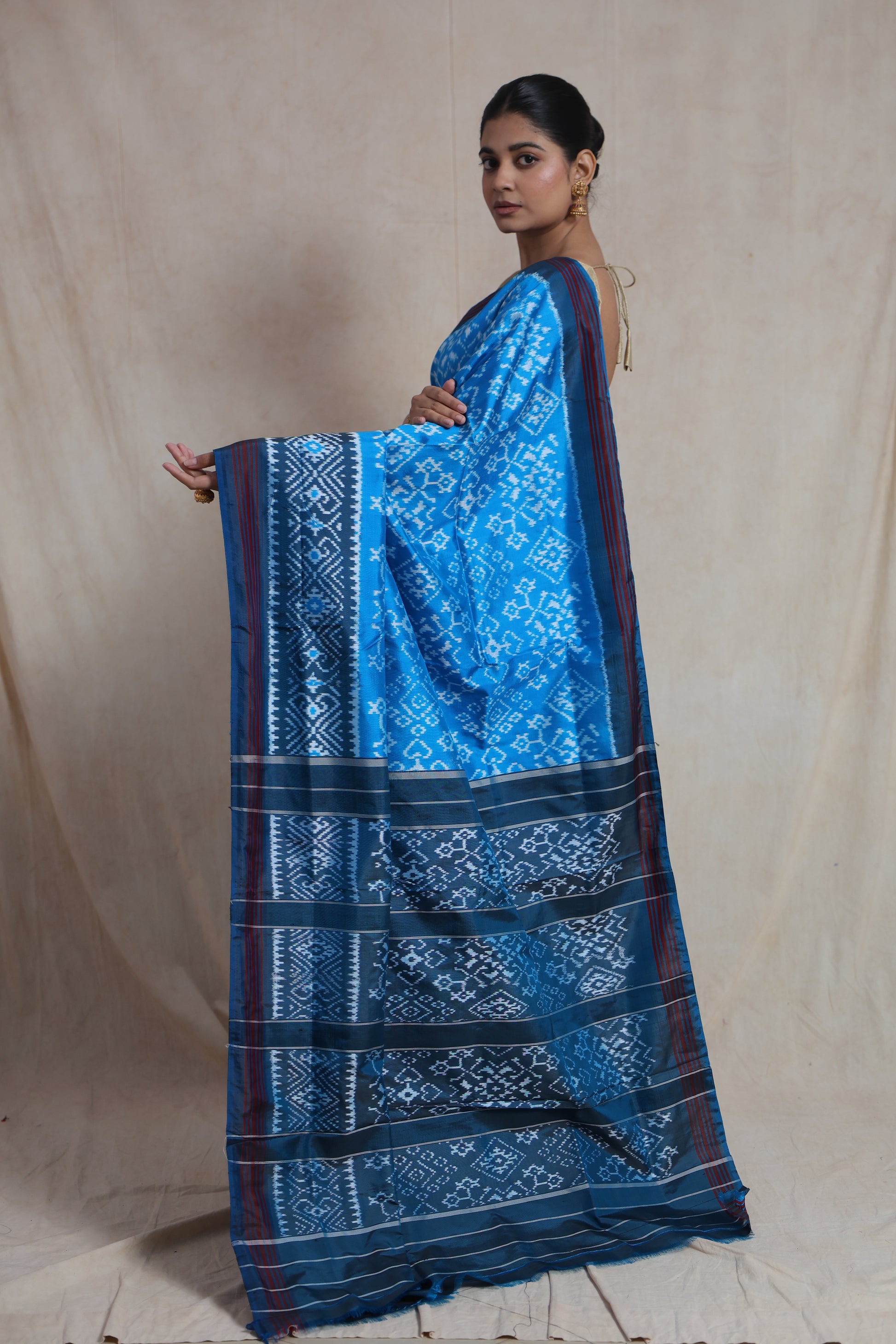 Side pallu view of blue Panchampali silk saree with woven geometric motifs