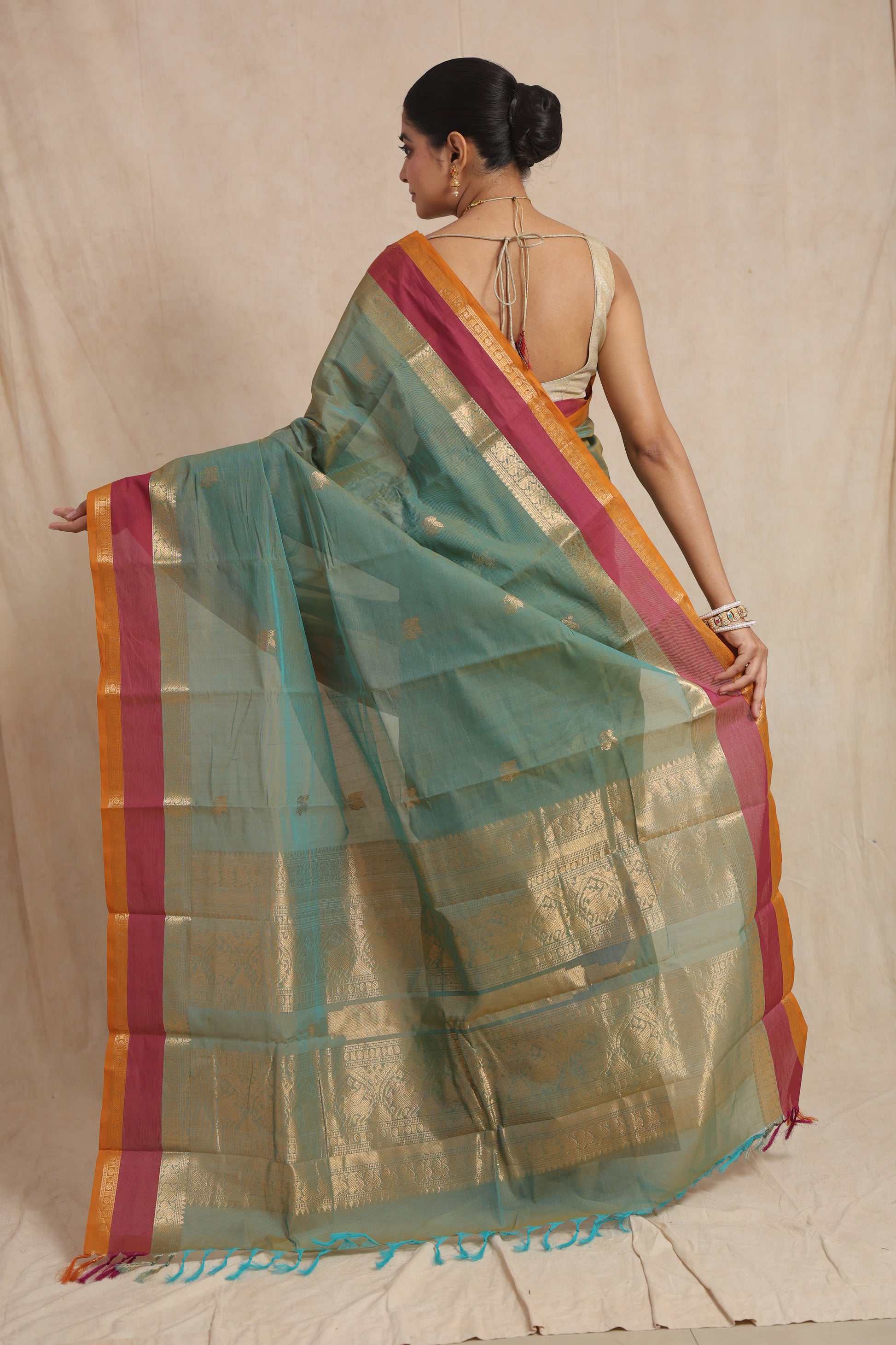 Back view of pastel aqua green Kanchipuram cotton saree