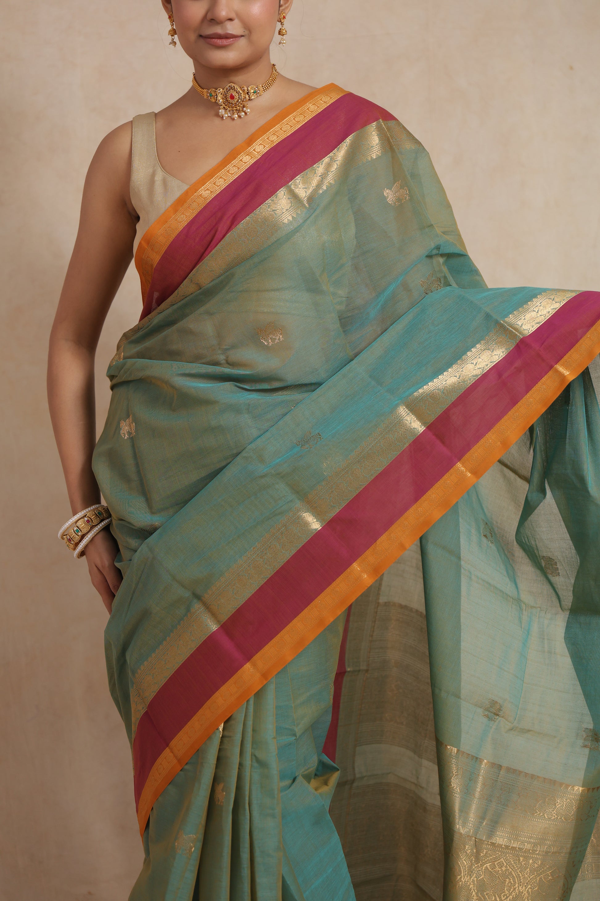 Flatlay detail of pastel aqua green Kanchipuram cotton saree