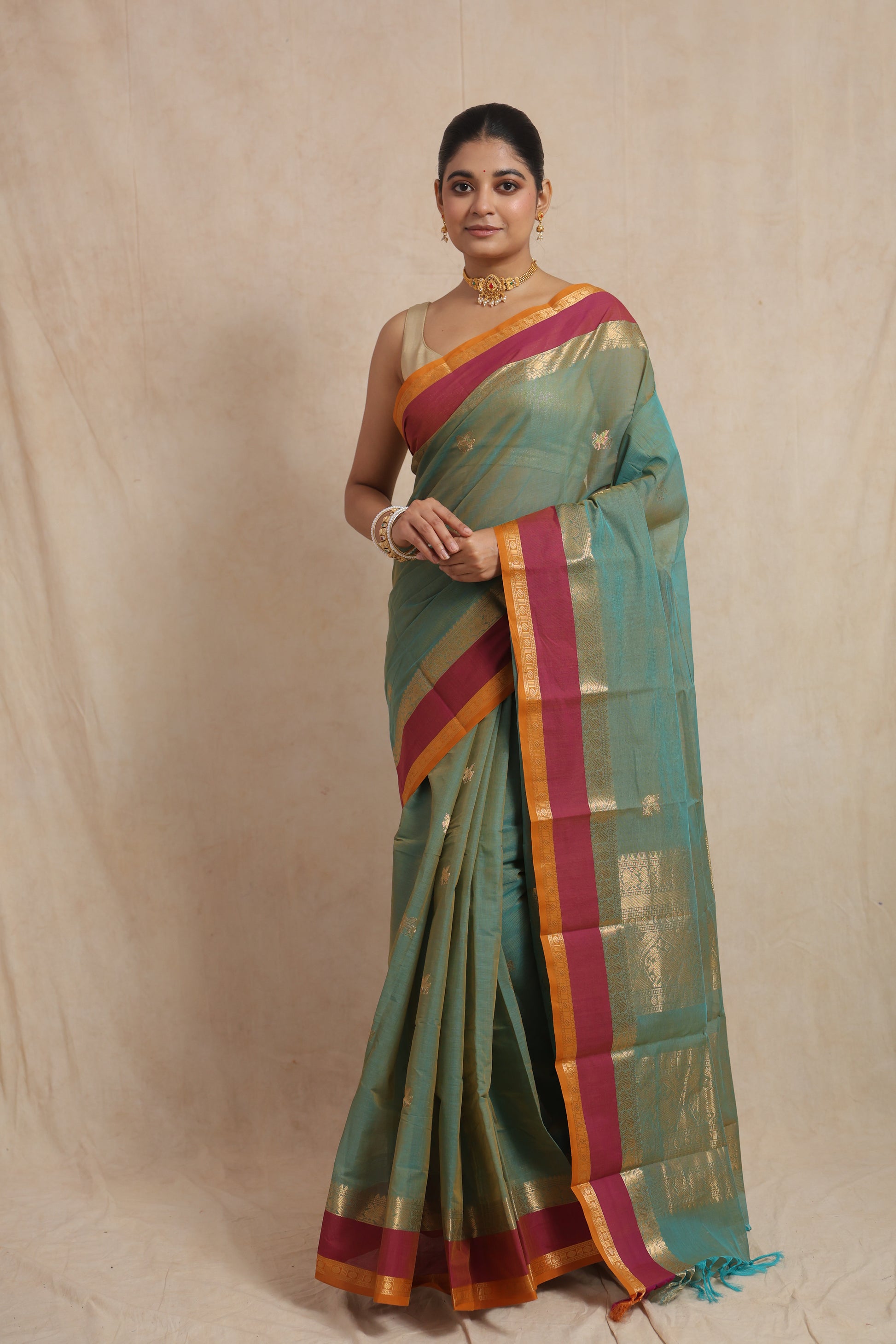 Front view of pastel aqua green Kanchipuram cotton saree