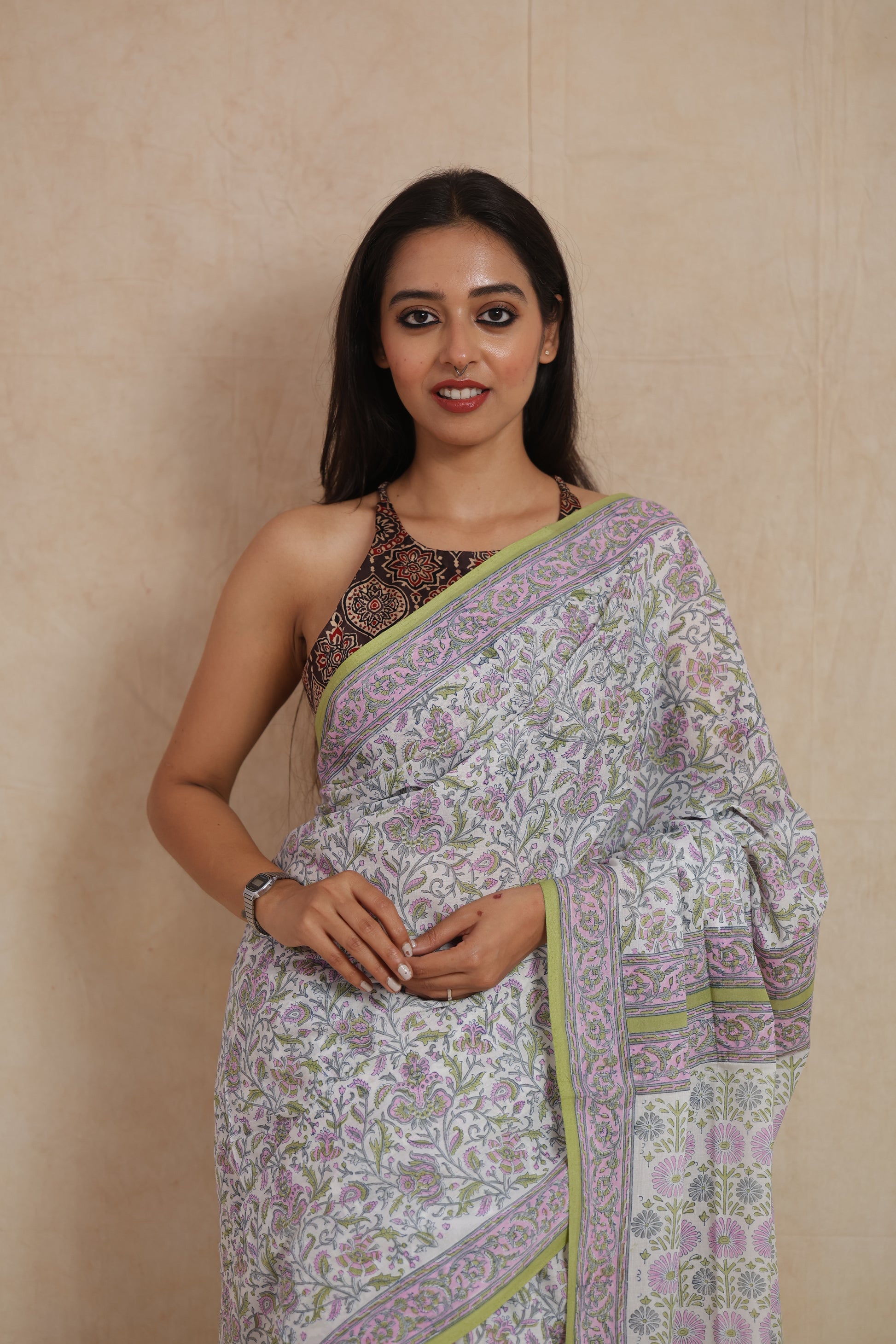 Pastel floral Sanganeri cotton saree with green border