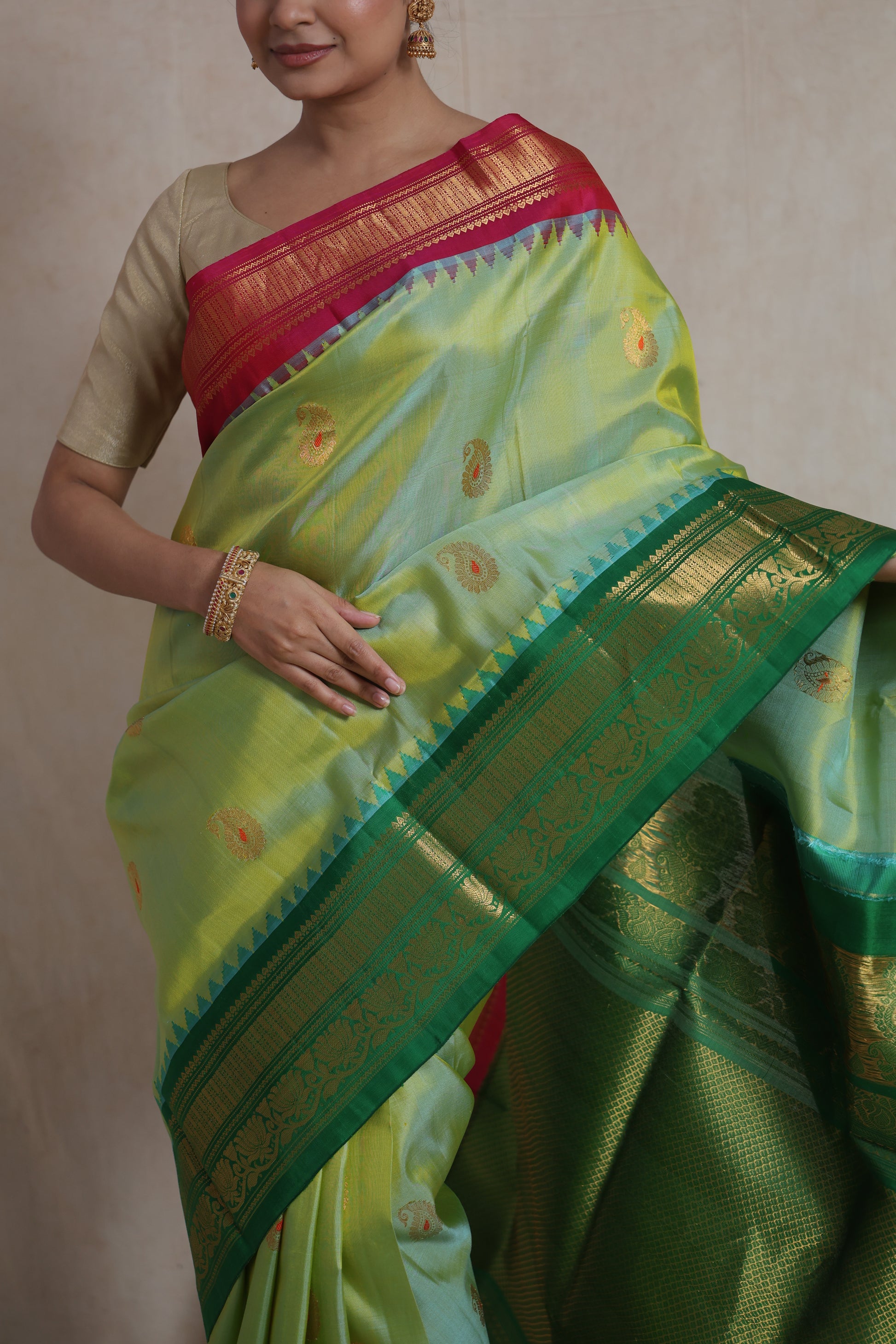 Elegant traditional look in pastel lime green Gadwal Sico saree