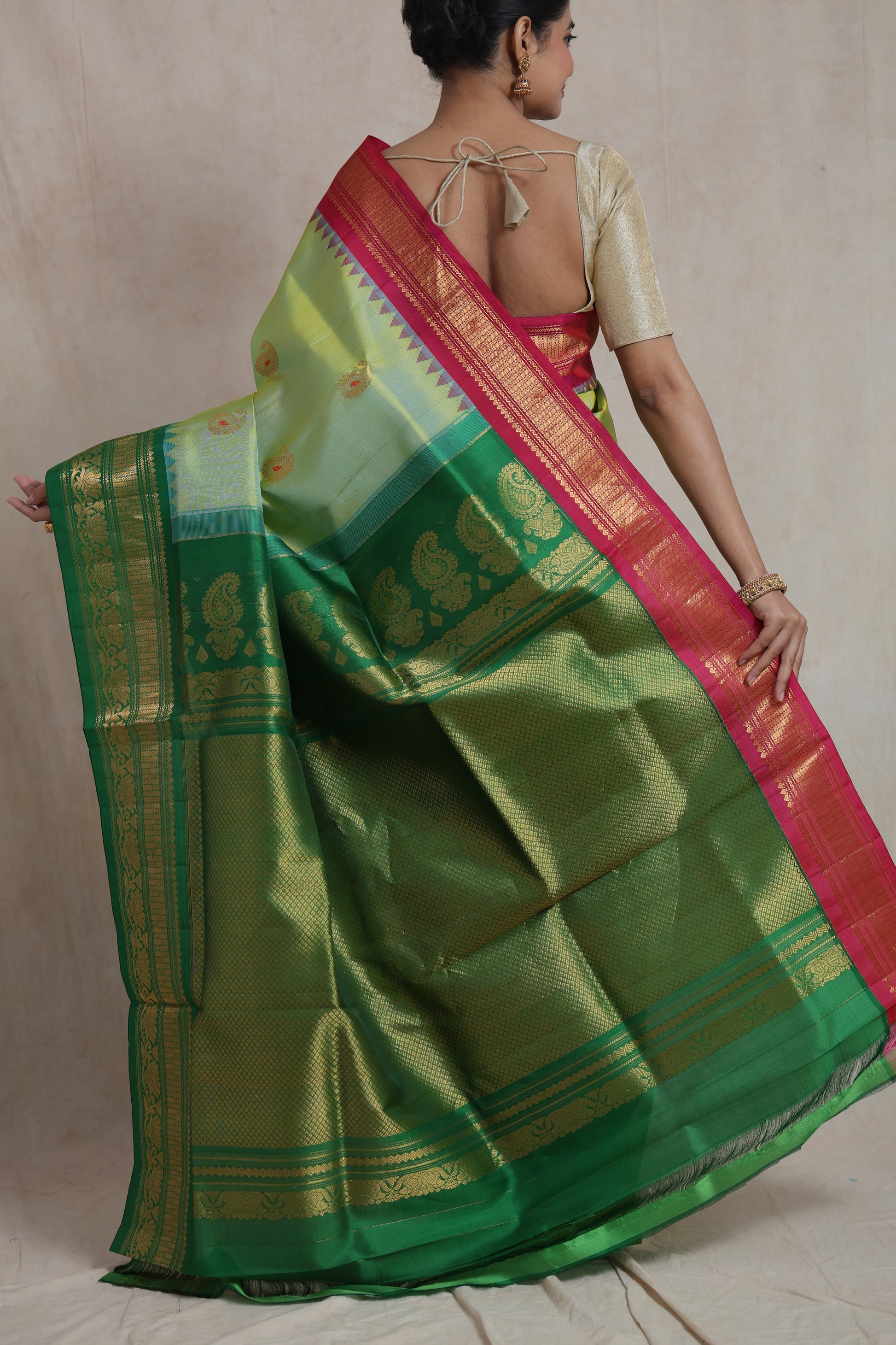 Detailed emerald green woven pallu of Gadwal Sico saree