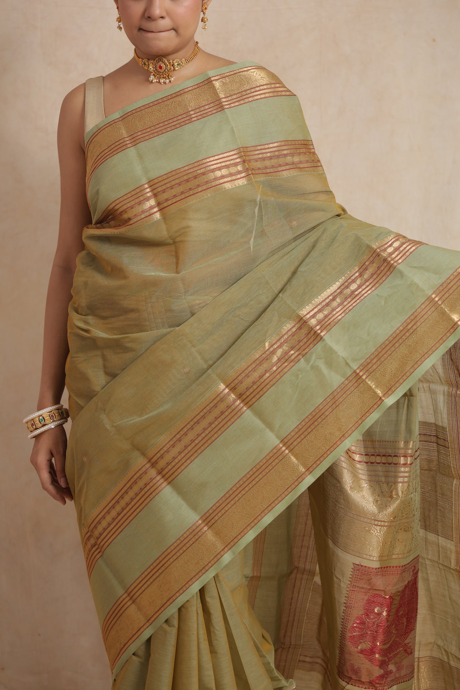 Fabric detail of pastel sage green Kanchipuram cotton saree