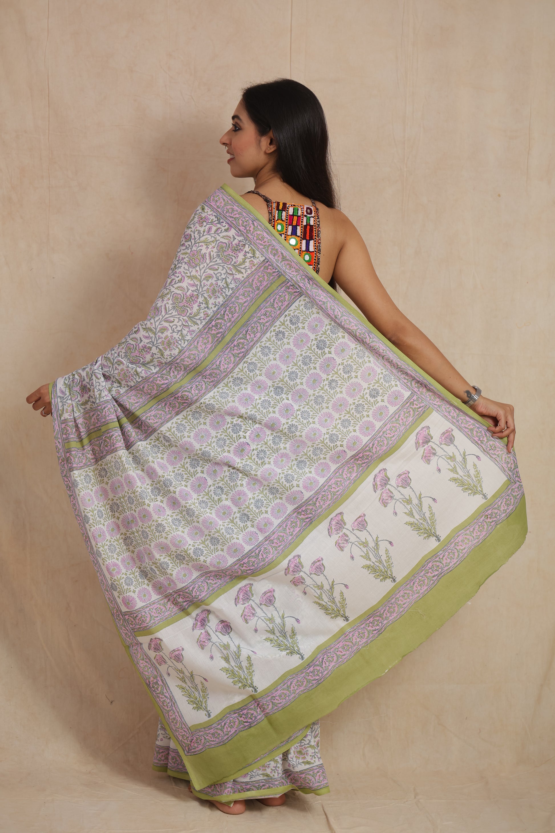Closeup view of pastel floral Sanganeri cotton saree