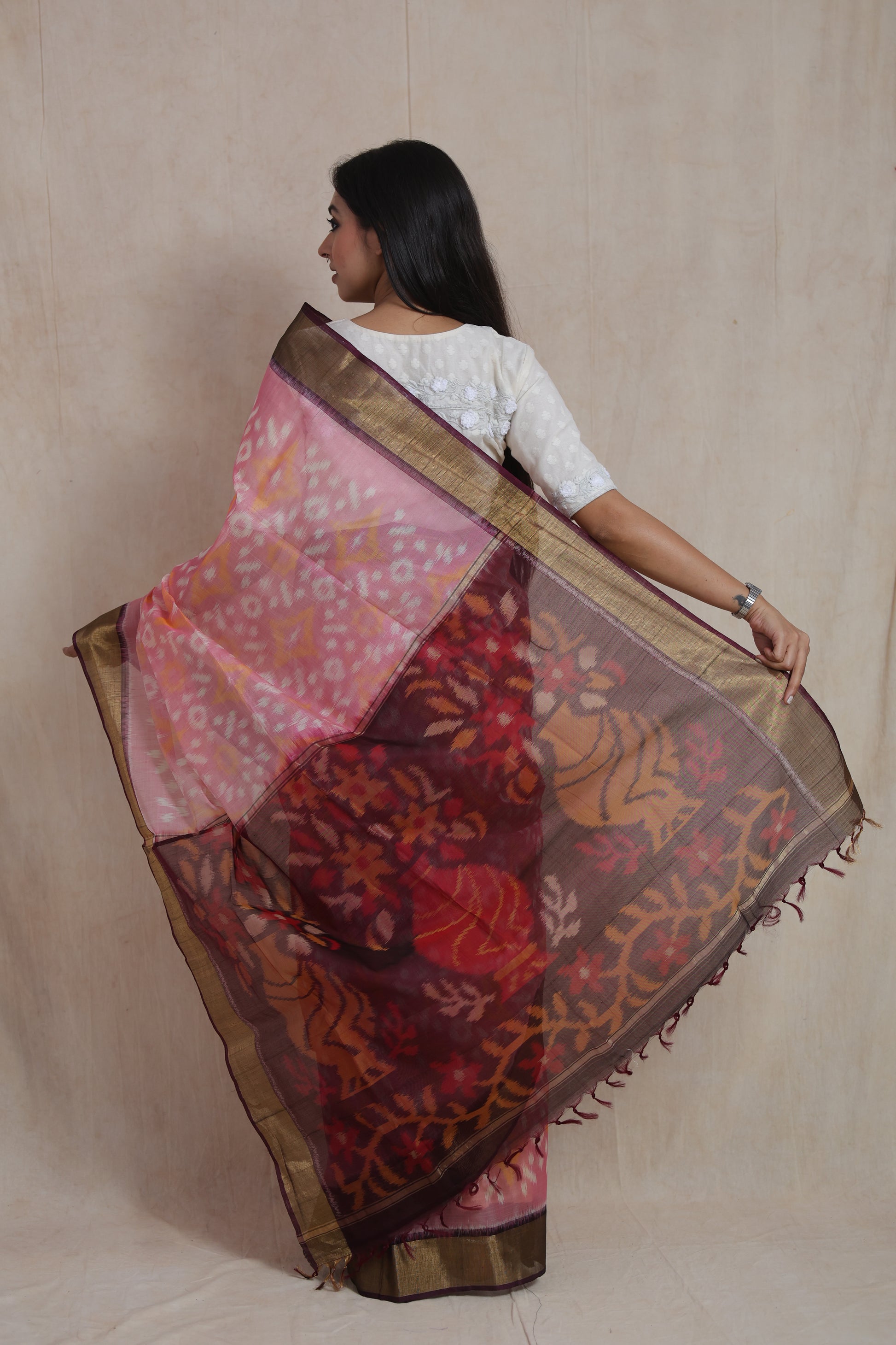 Back view of Panchampali handloom silk cotton saree showcasing contrast floral pallu and gold-toned border