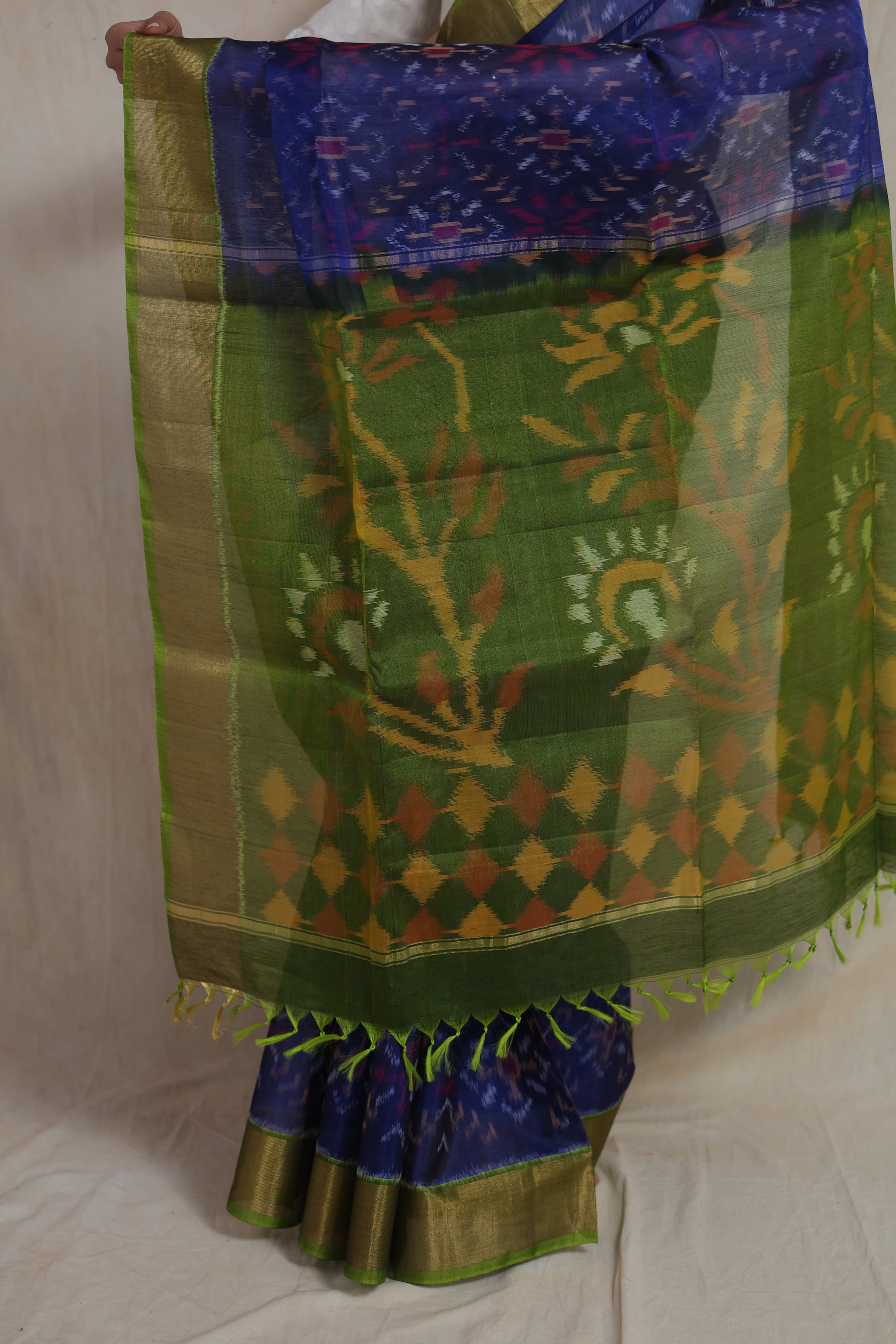 Close-up view of olive green woven pallu on royal blue Panchampali SICO saree