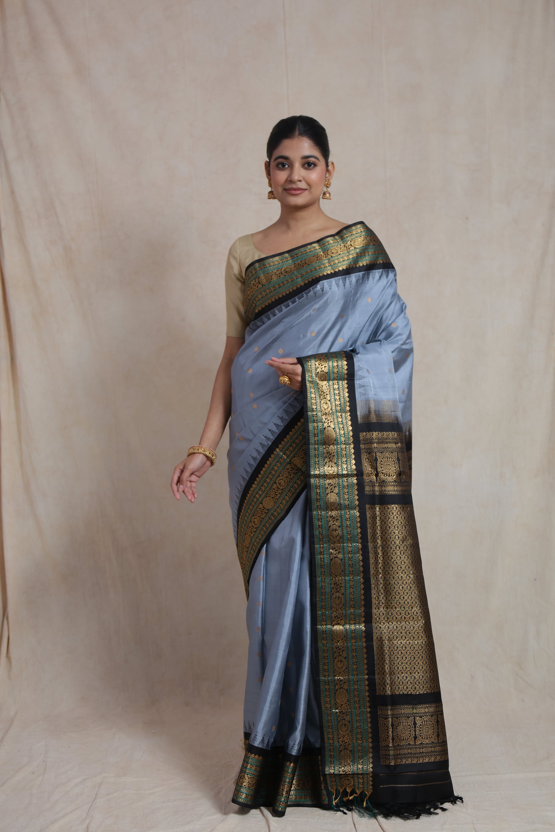 Full front view of powder blue Gadwal Silk saree with rich woven pallu