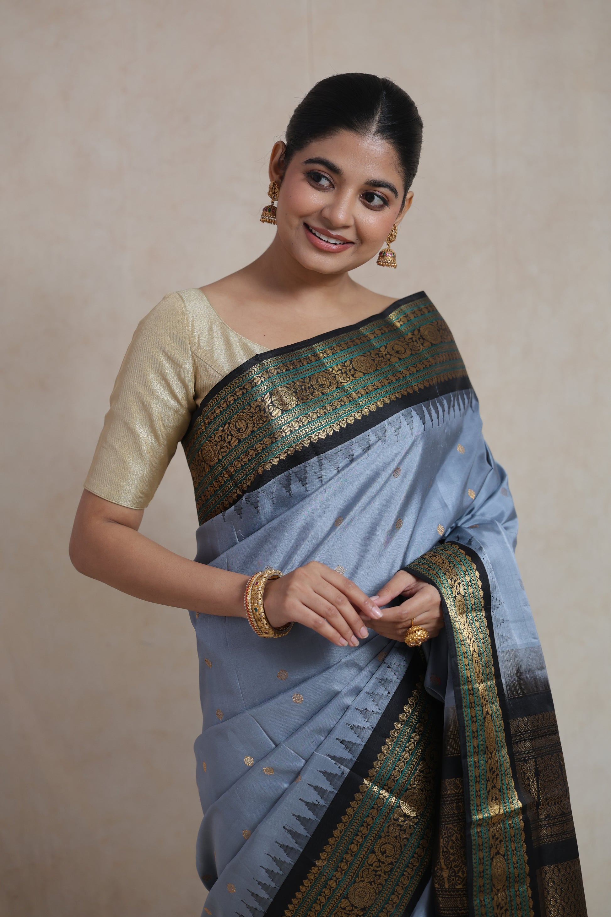 Side pose of powder blue Gadwal Silk saree with elegant woven detailing