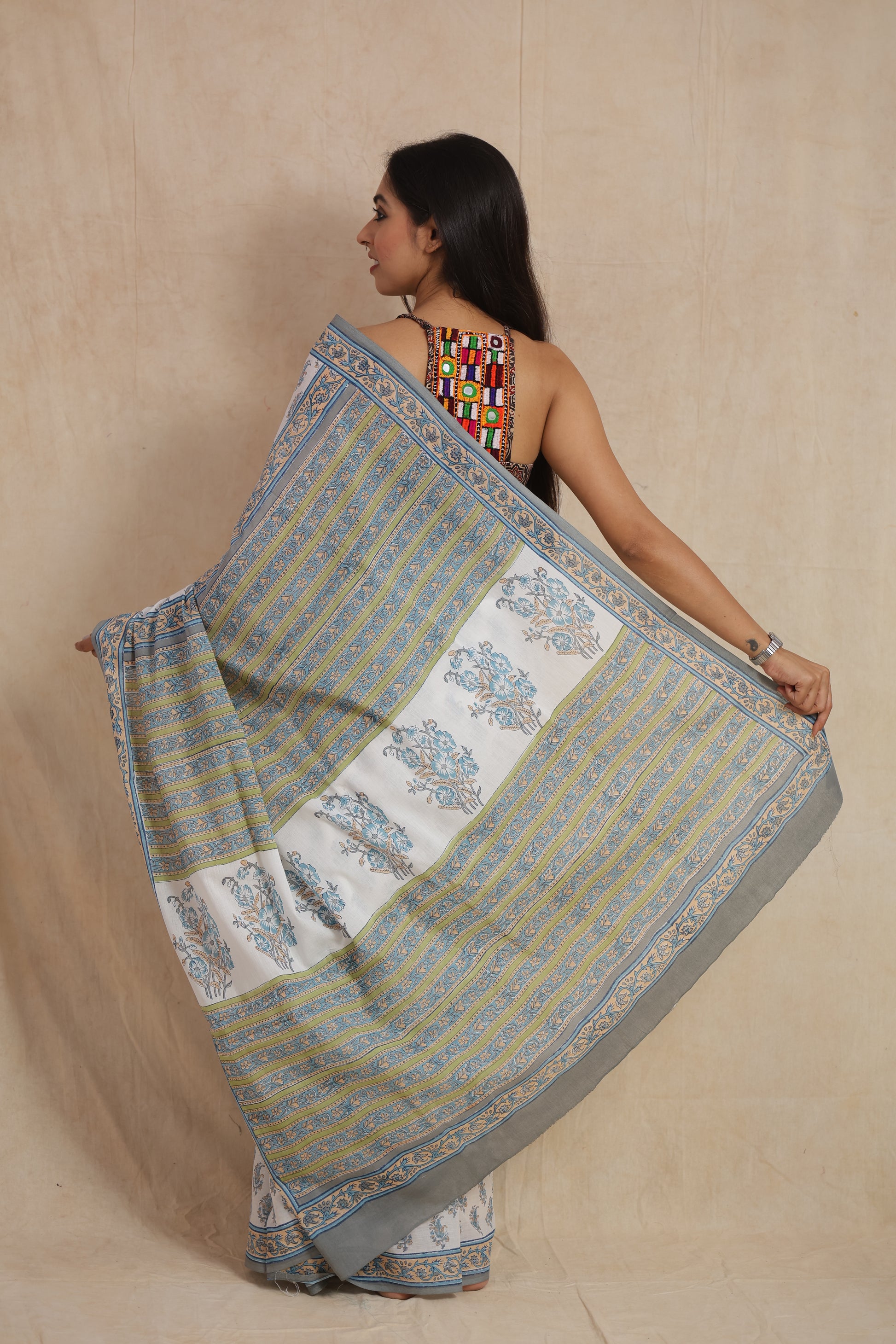Back pallu view of powder blue Sanghnaree cotton saree with striped design