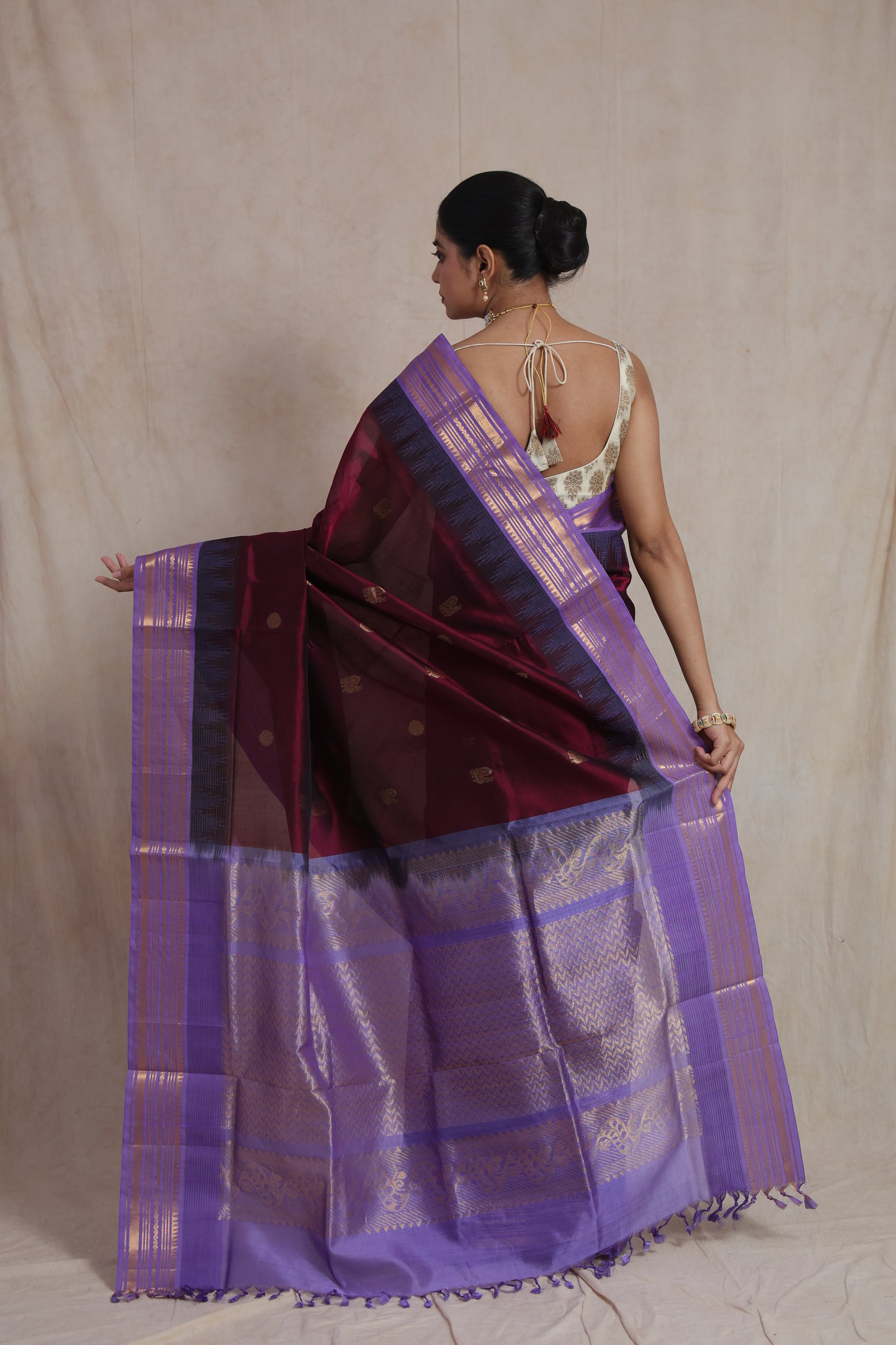 Premium Kanjipuram silk cotton saree with woven zari motifs and rich texture