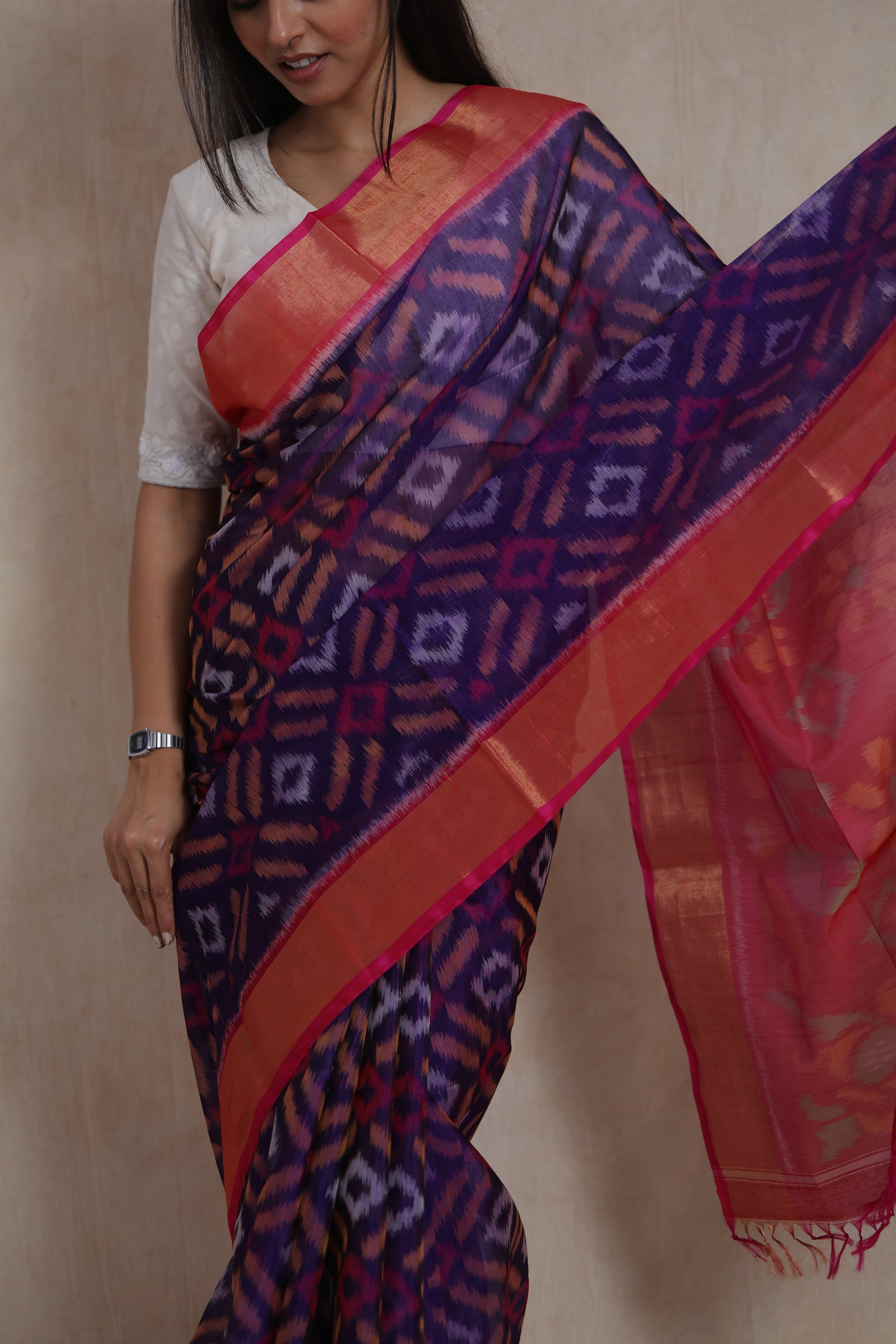 Draped close-up view of purple Panchampali SICO saree with Ikat motifs