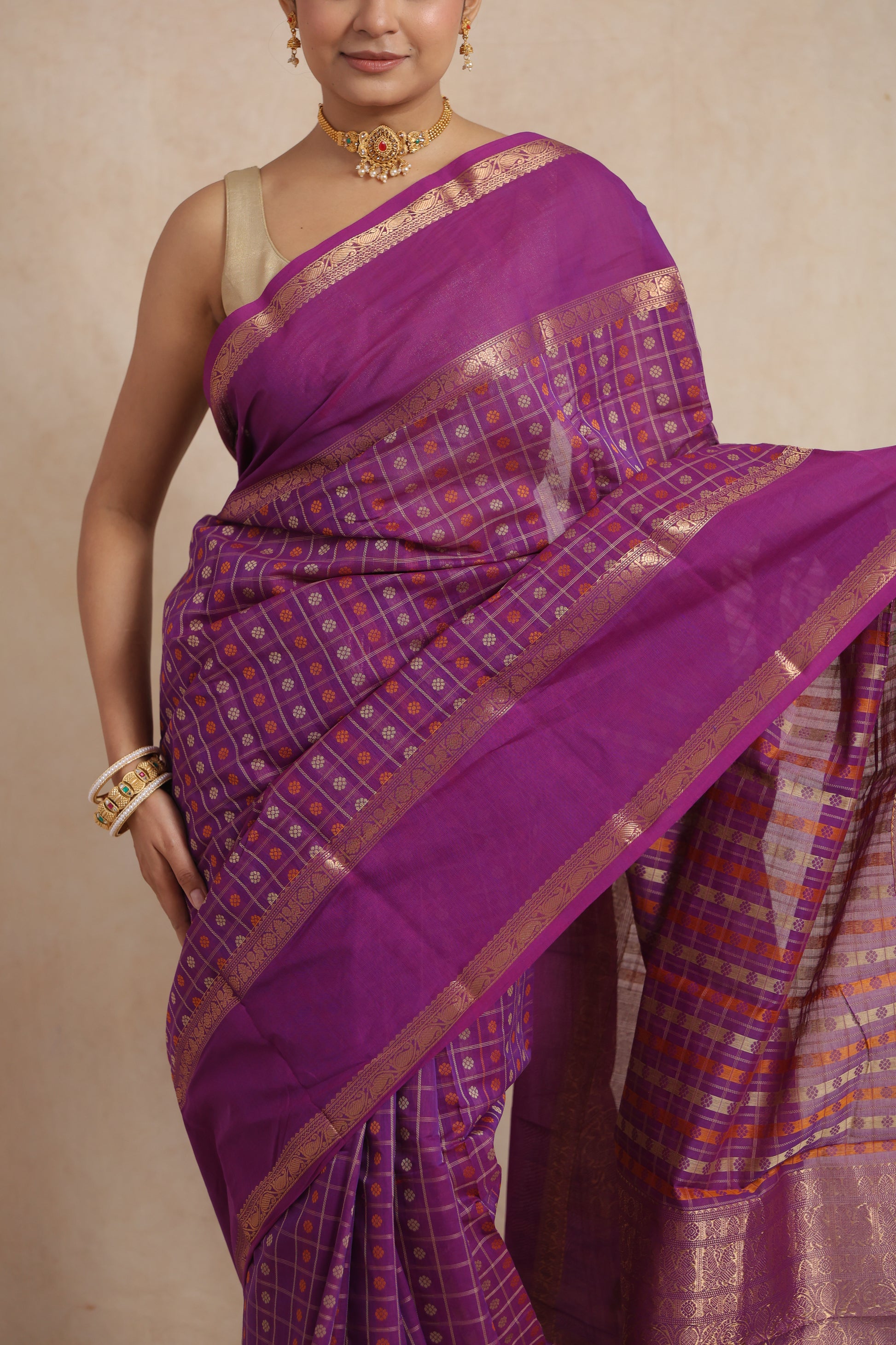Elegant drape detail of purple Kanchipuram cotton saree