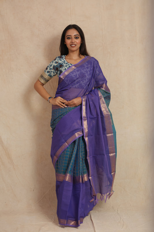 Full-length look of royal purple Kanchipuram cotton saree with teal checked pallu