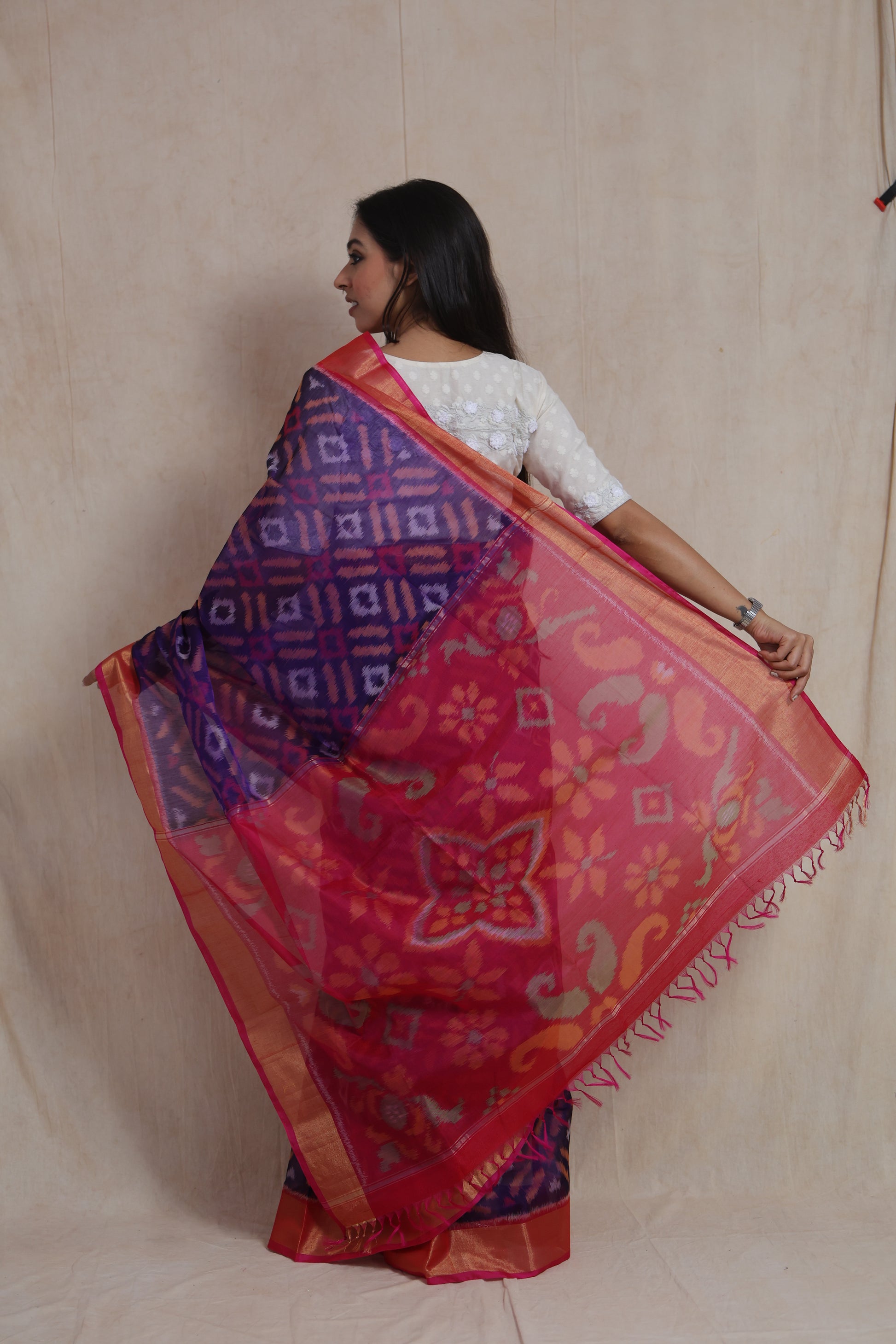 Back pallu display of purple and pink Panchampali SICO saree with floral woven design