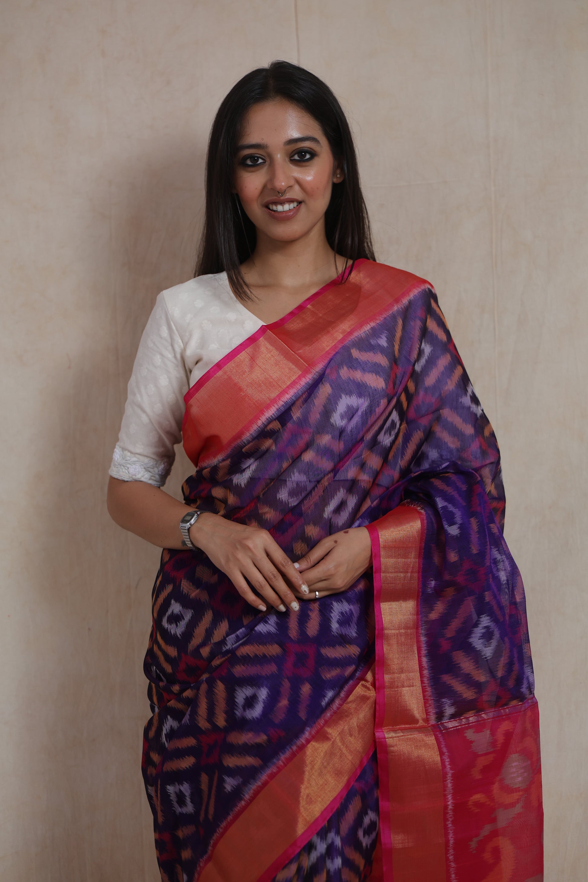 Portrait styling view of handwoven purple and pink Panchampali SICO saree