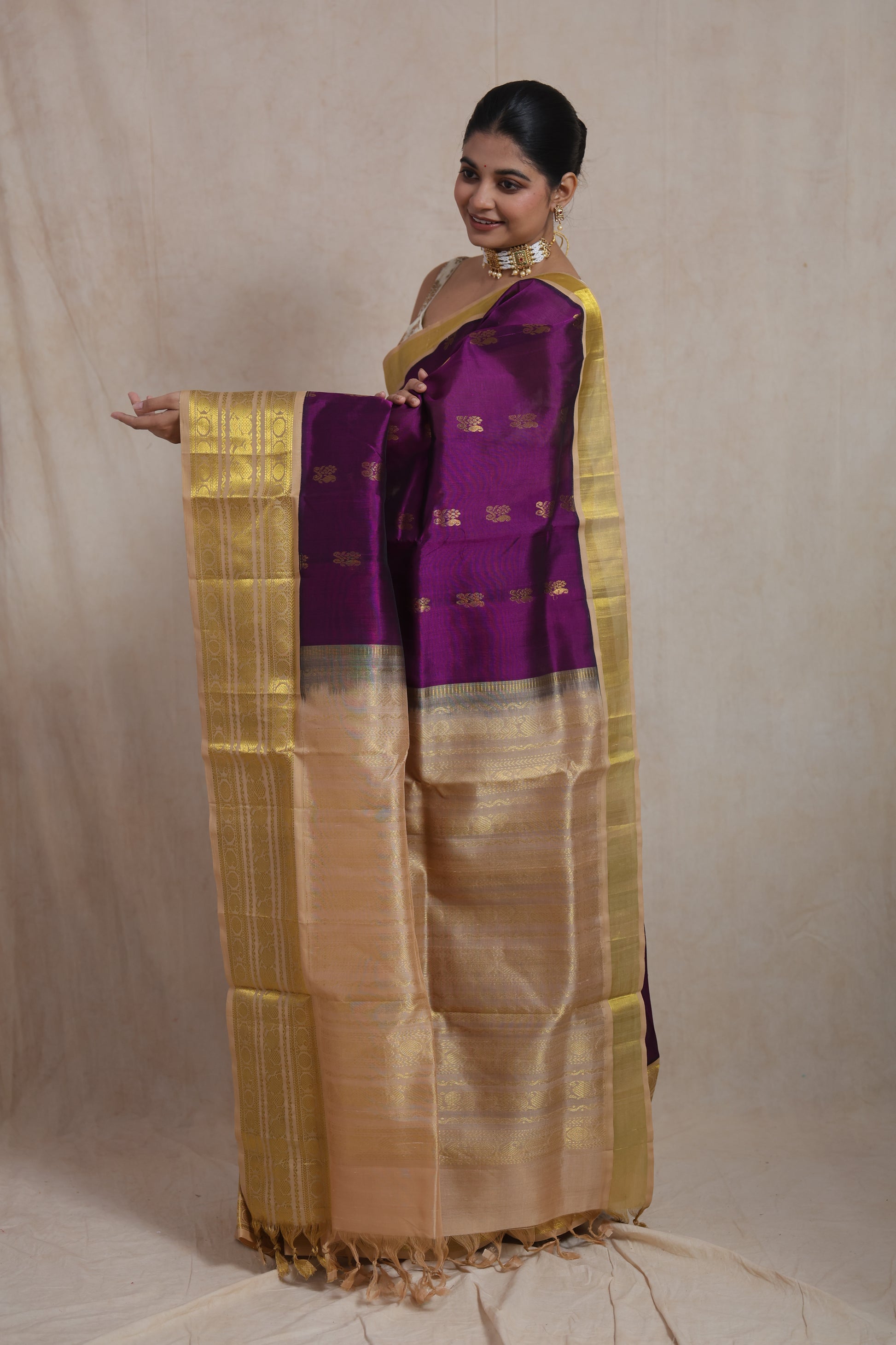 Royal purple Kanchipuram SICO saree showcasing an elegant gold woven pallu and intricate craftsmanship