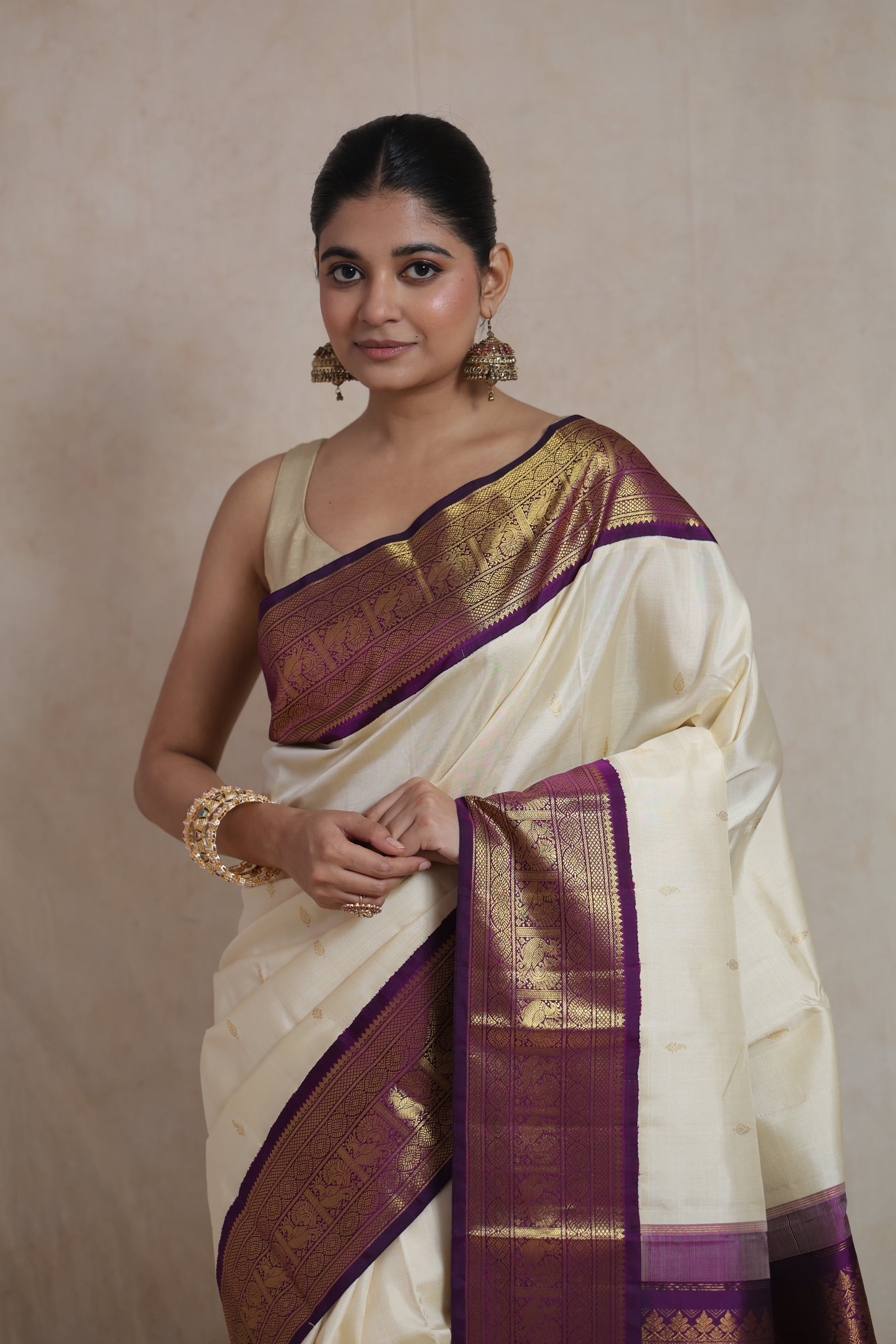 Close-up of purple and gold zari border on Kanchipuram silk saree