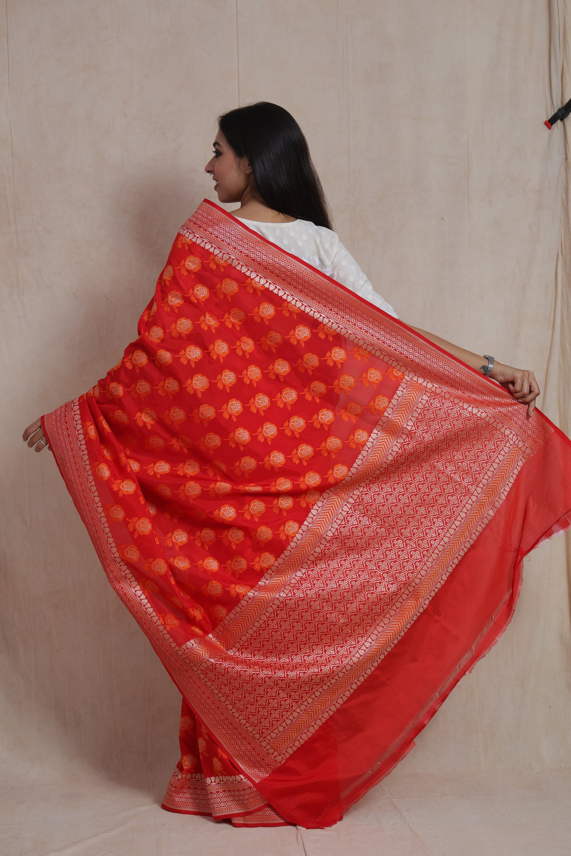 Back view of radiant red Banarasi art silk saree with rich zari woven pallu