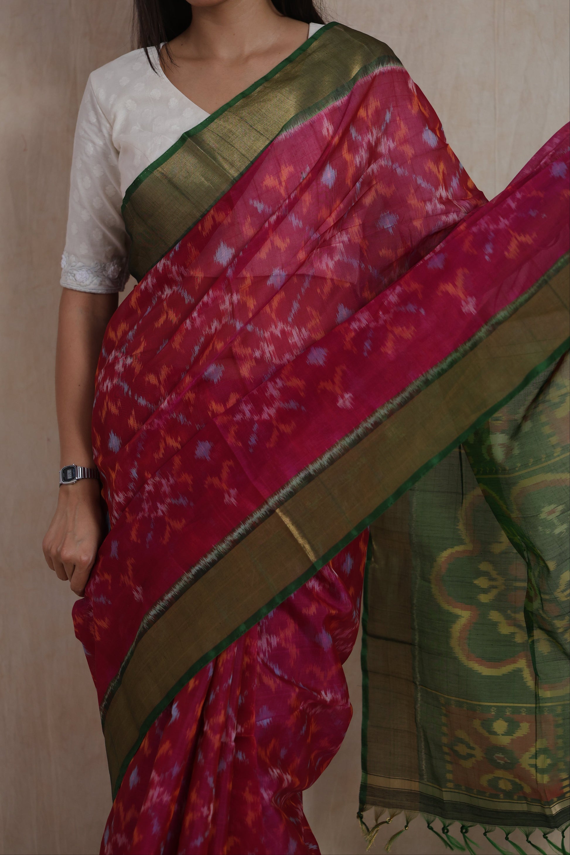 Detailed drape view of rani pink Panchampali SICO saree with traditional ikat-inspired weaving