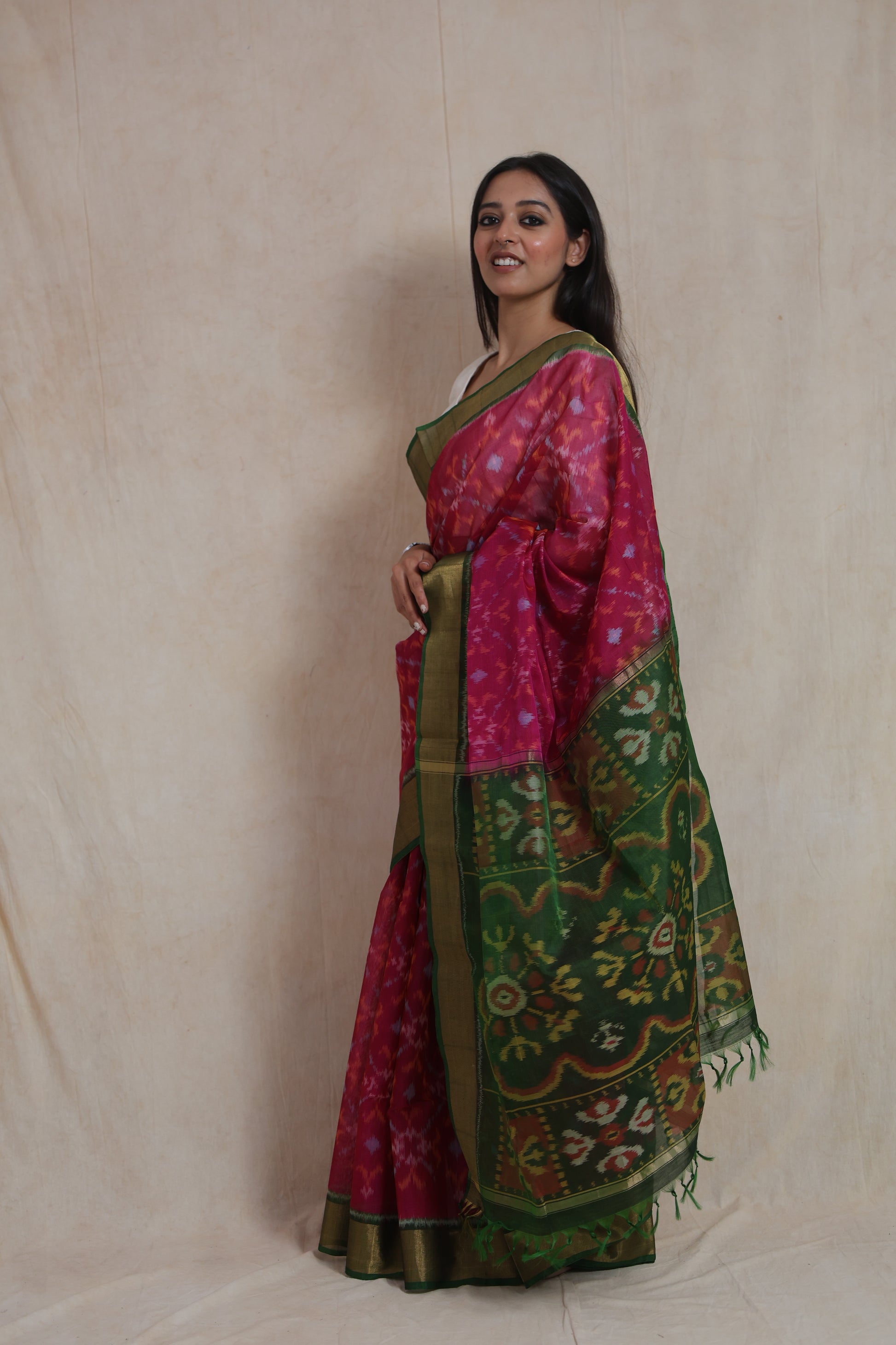 Side profile of Panchampali SICO saree featuring vibrant pink body and green woven pallu