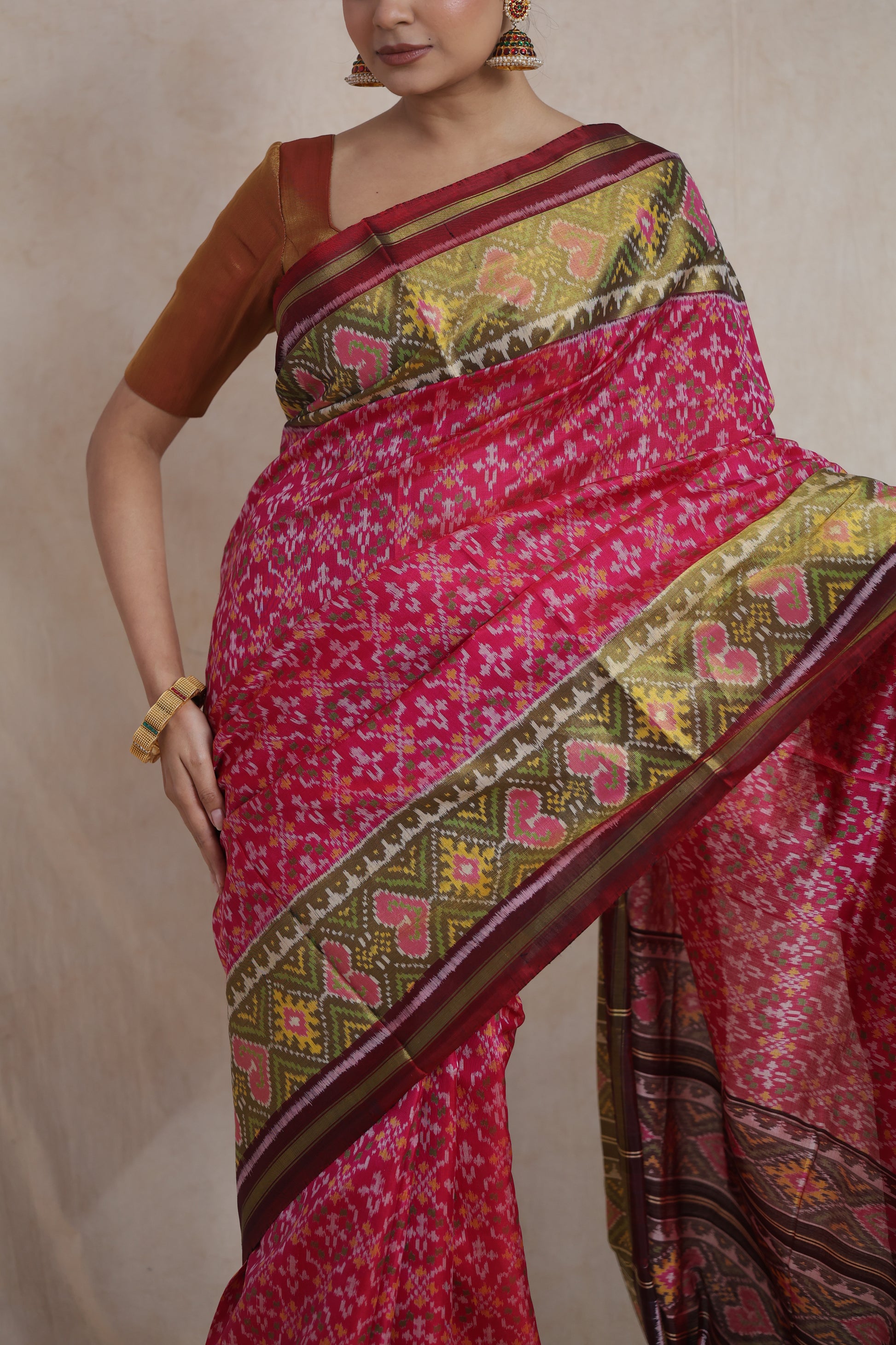 Border detail of handcrafted Patola silk saree with geometric motifs