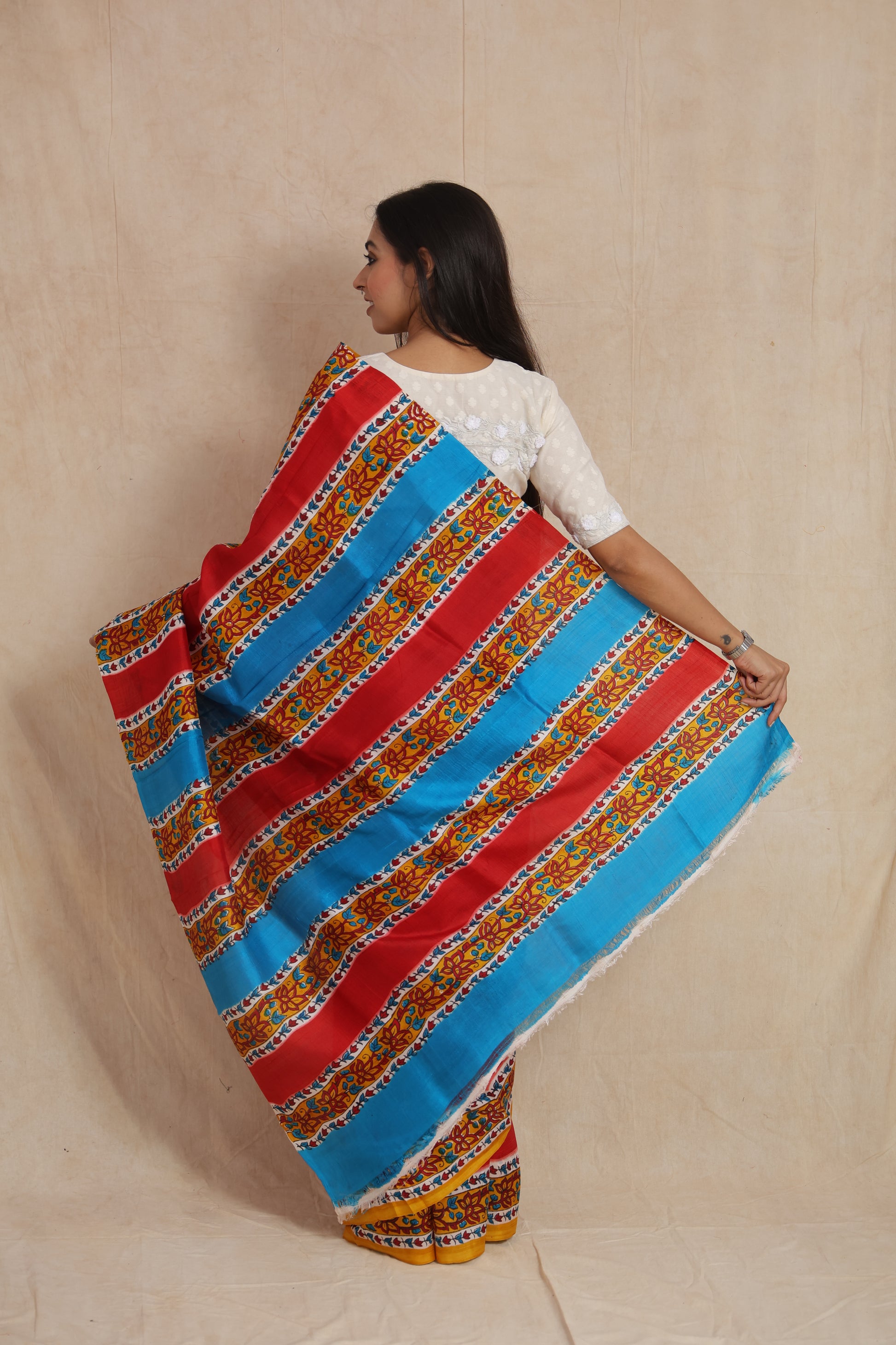 Back pallu display of red Garad silk saree