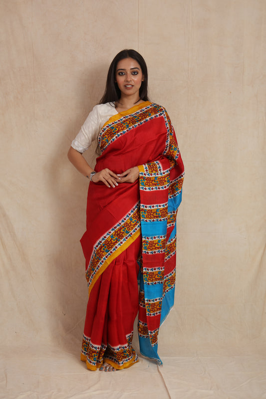 Front view of red Garad silk saree with floral border