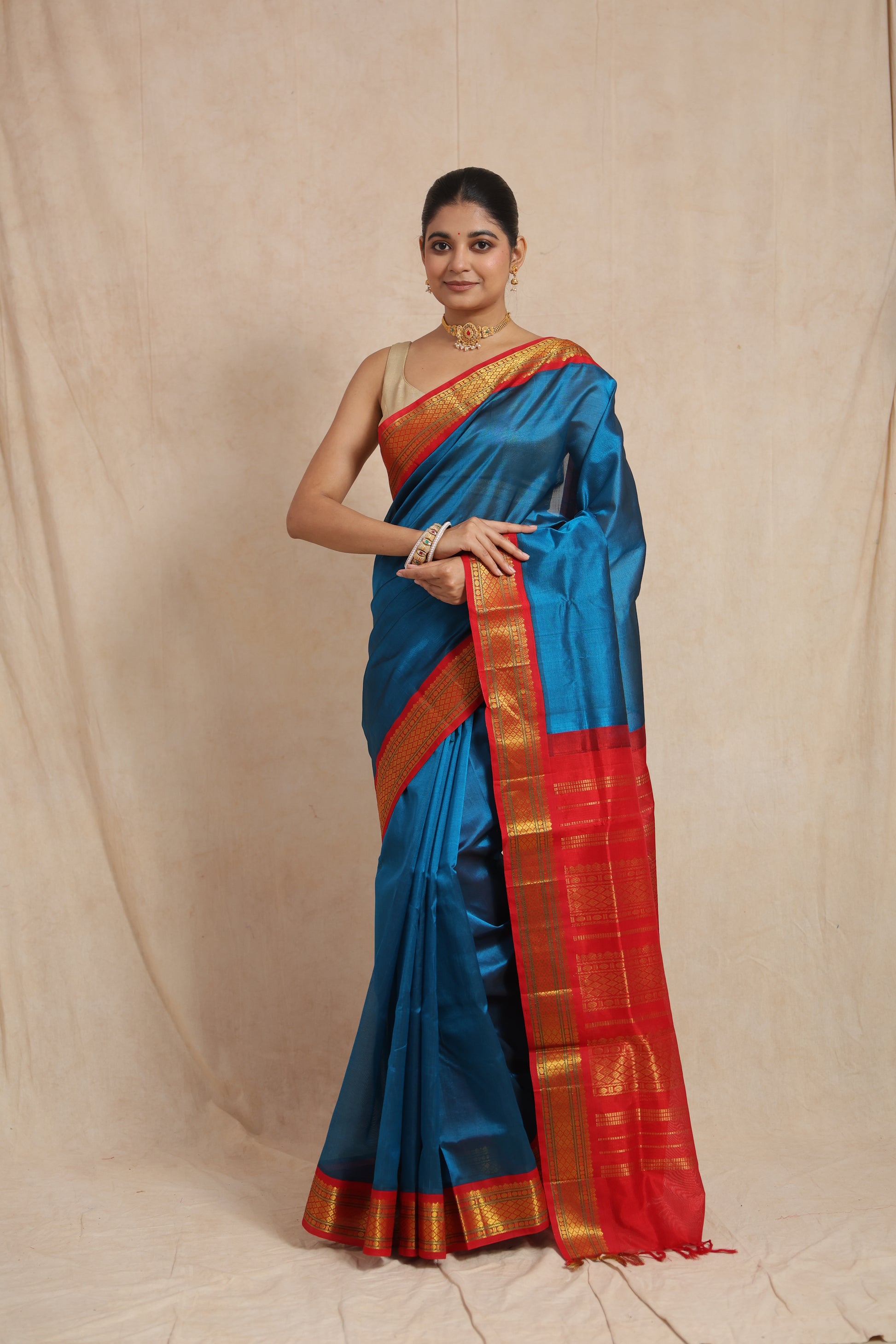 Elegant front drape of royal blue Kanchipuram Sico saree with contrast border