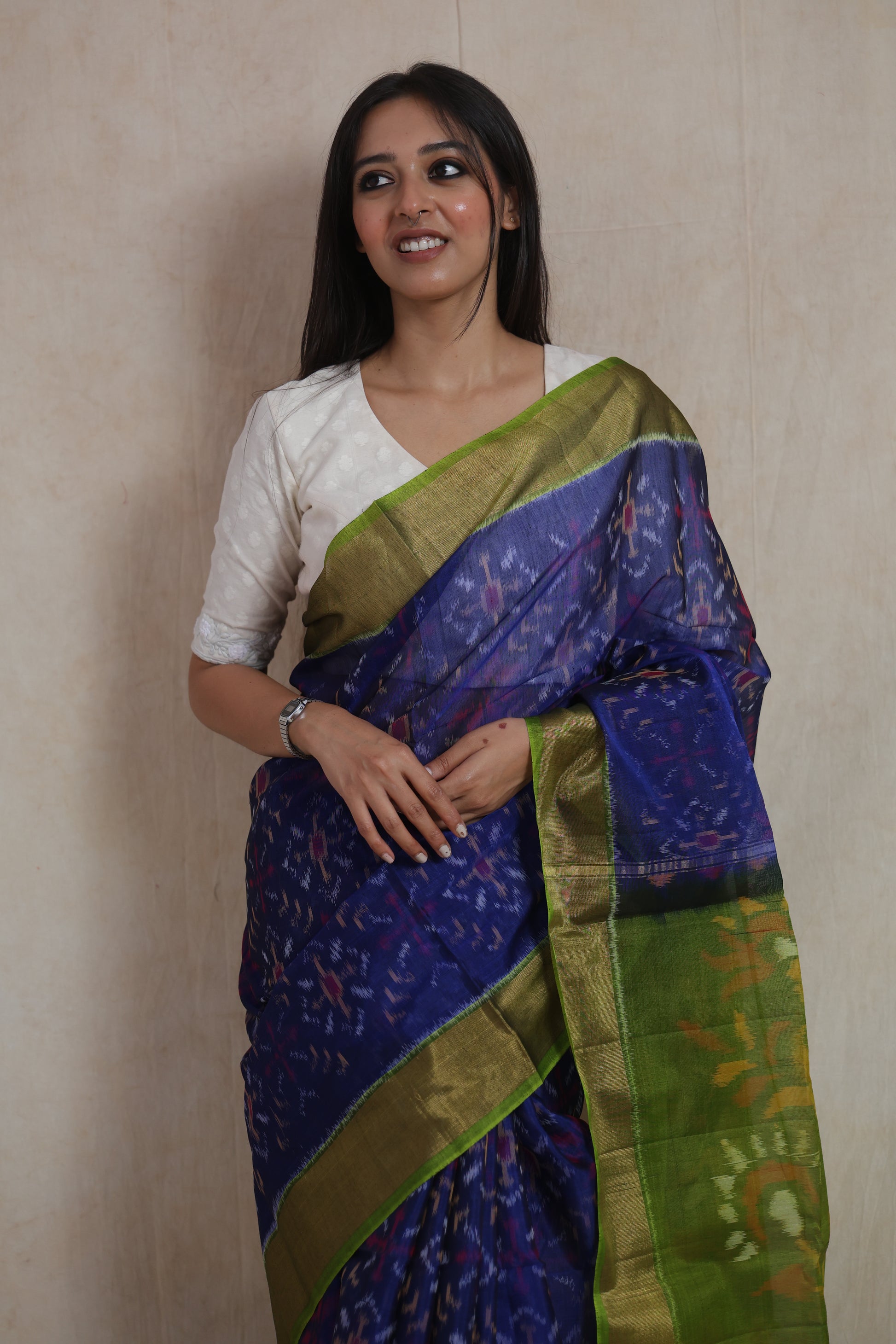 Draped view of royal blue Pochampally SICO saree with intricate Ikat motifs