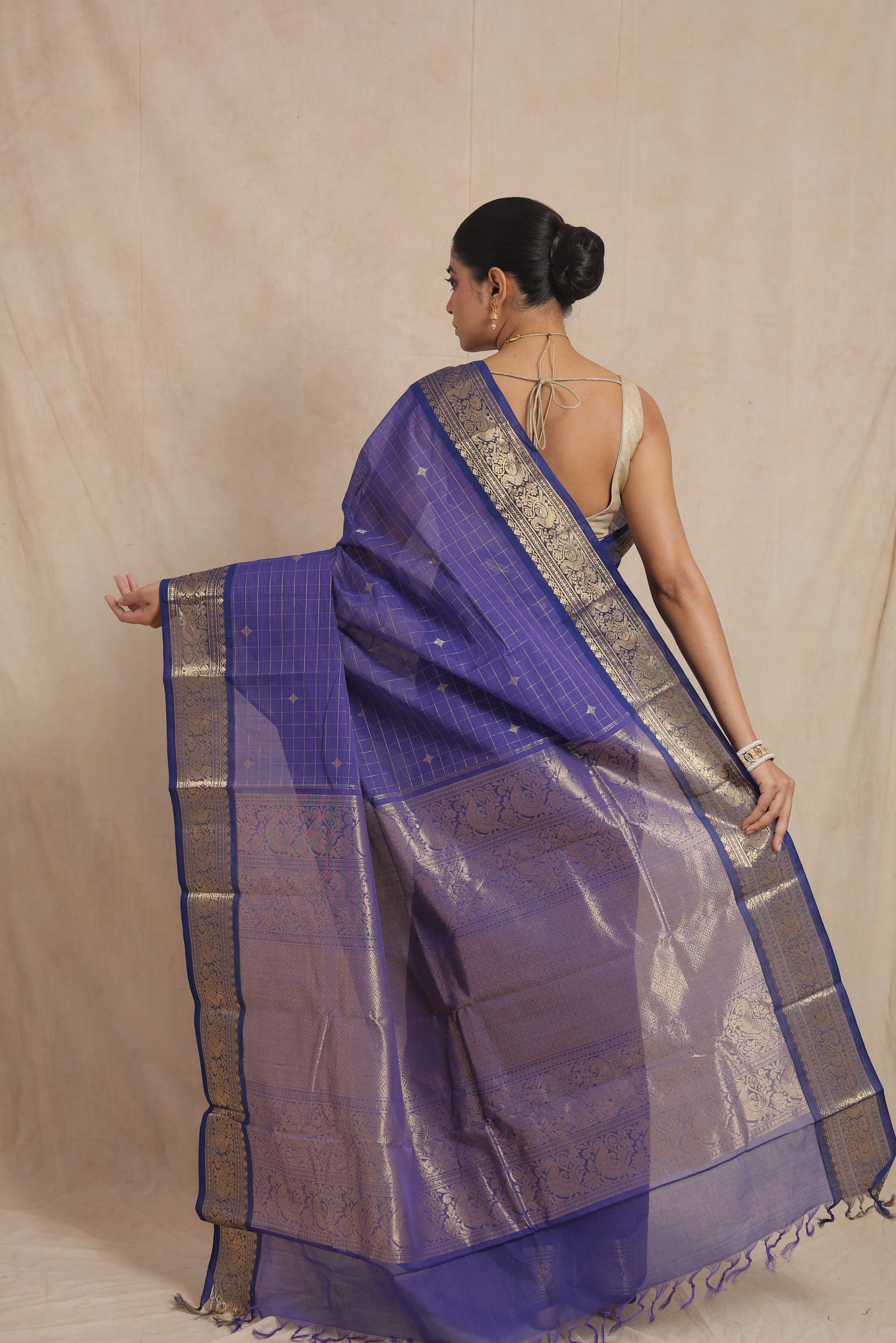 Back view of royal blue Kanchipuram cotton saree showing rich pallu