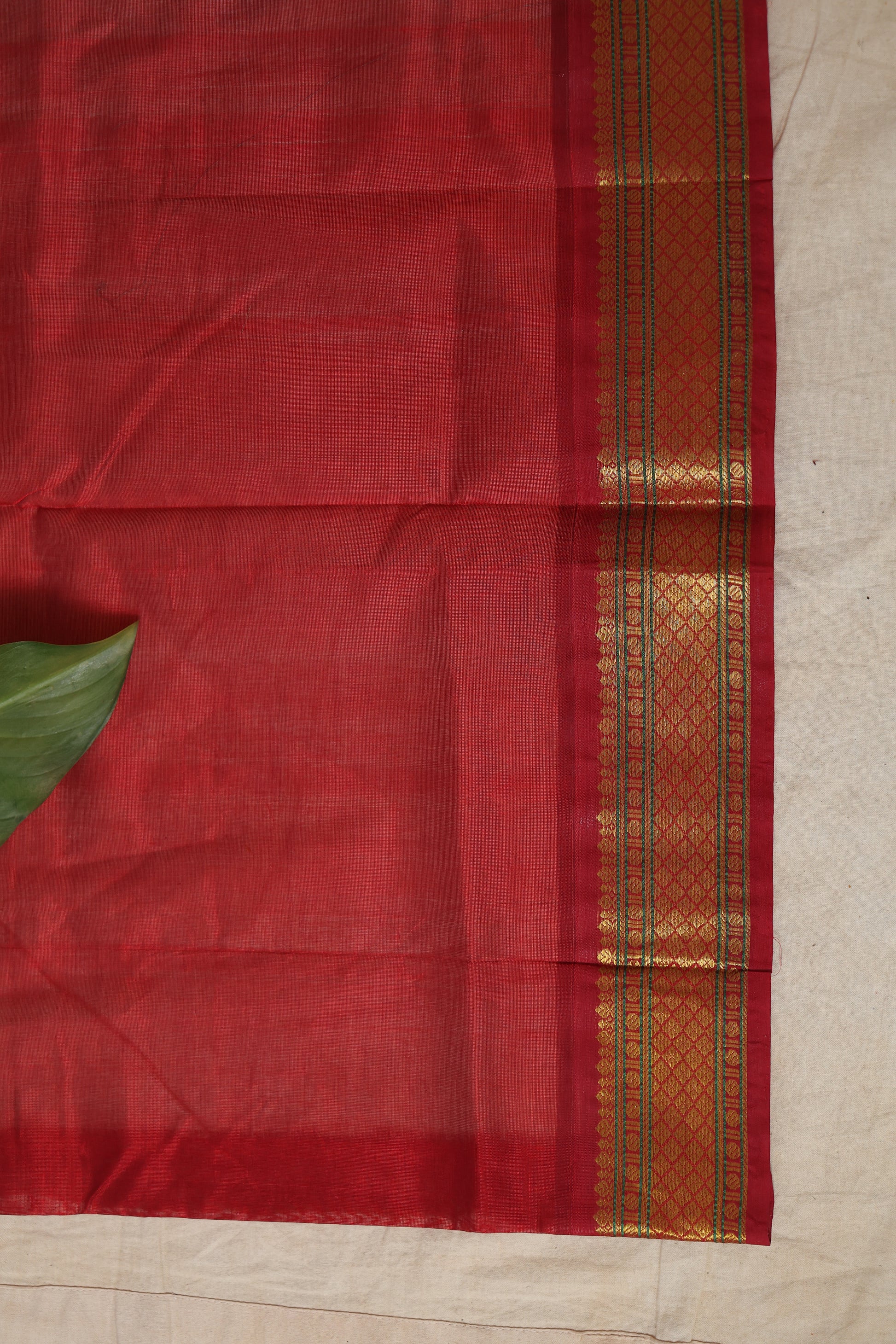 Matching crimson red blouse piece with zari woven border for Kanchipuram Sico saree