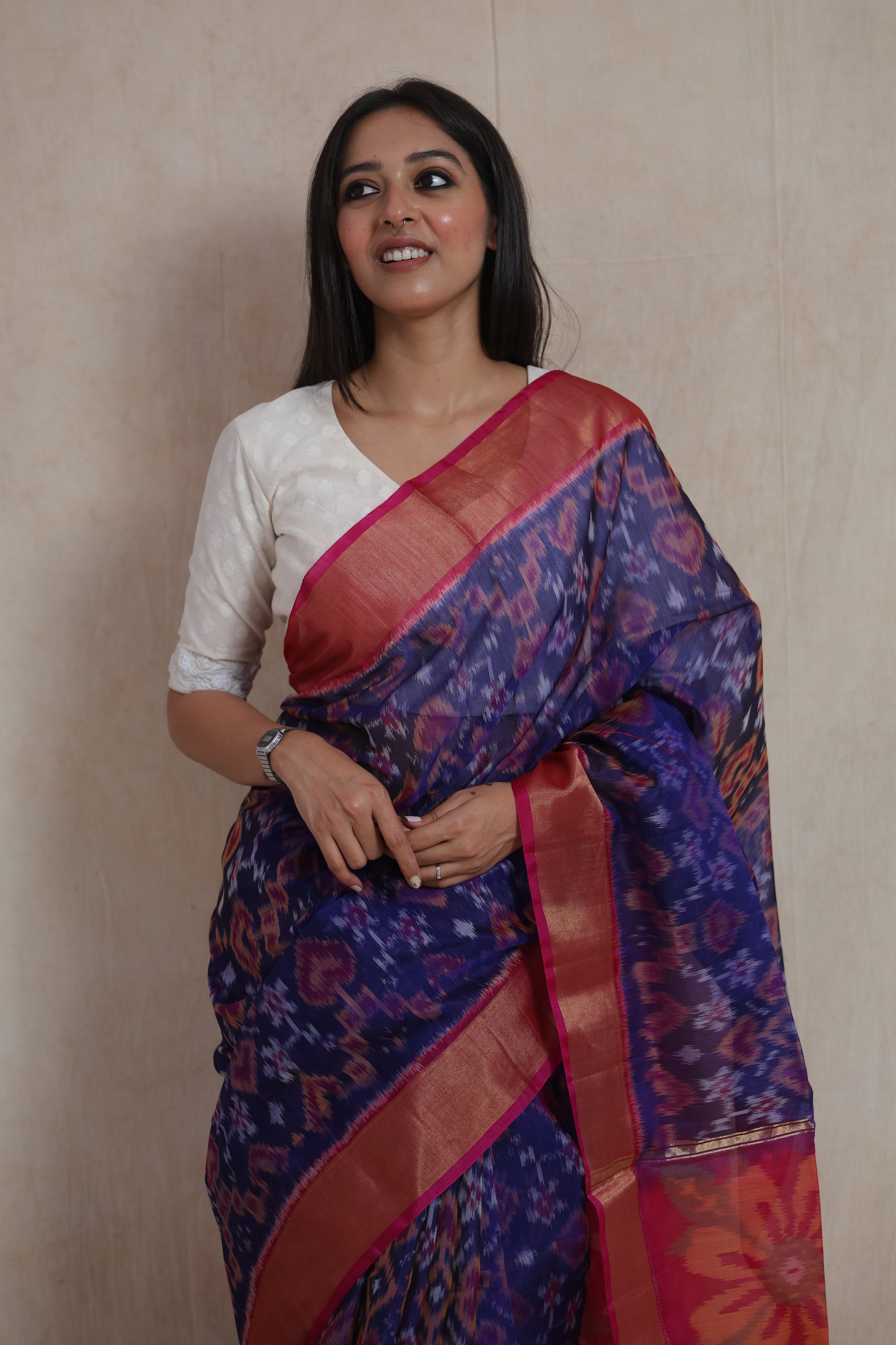 Detailed view of royal blue Panchampali handloom silk cotton saree featuring geometric Ikat motifs and vibrant floral pallu design