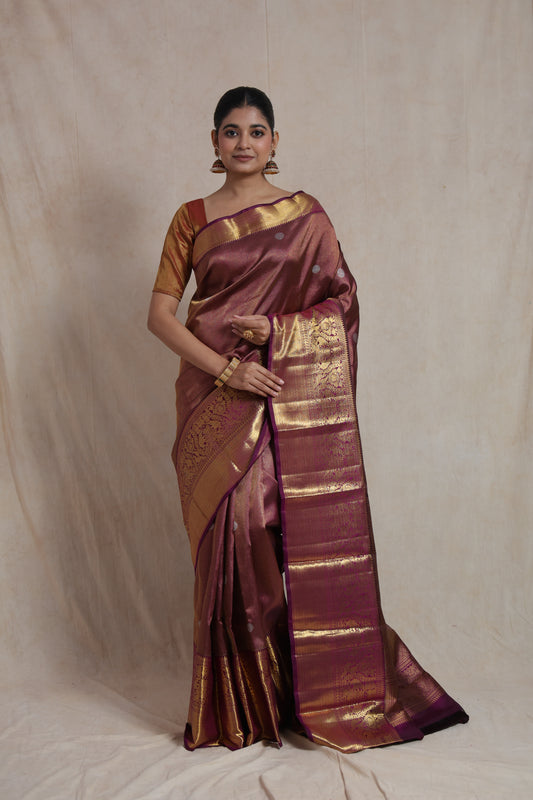 Front drape view of mauve Kanjivaram pure silk saree with silver buttas and rich gold border