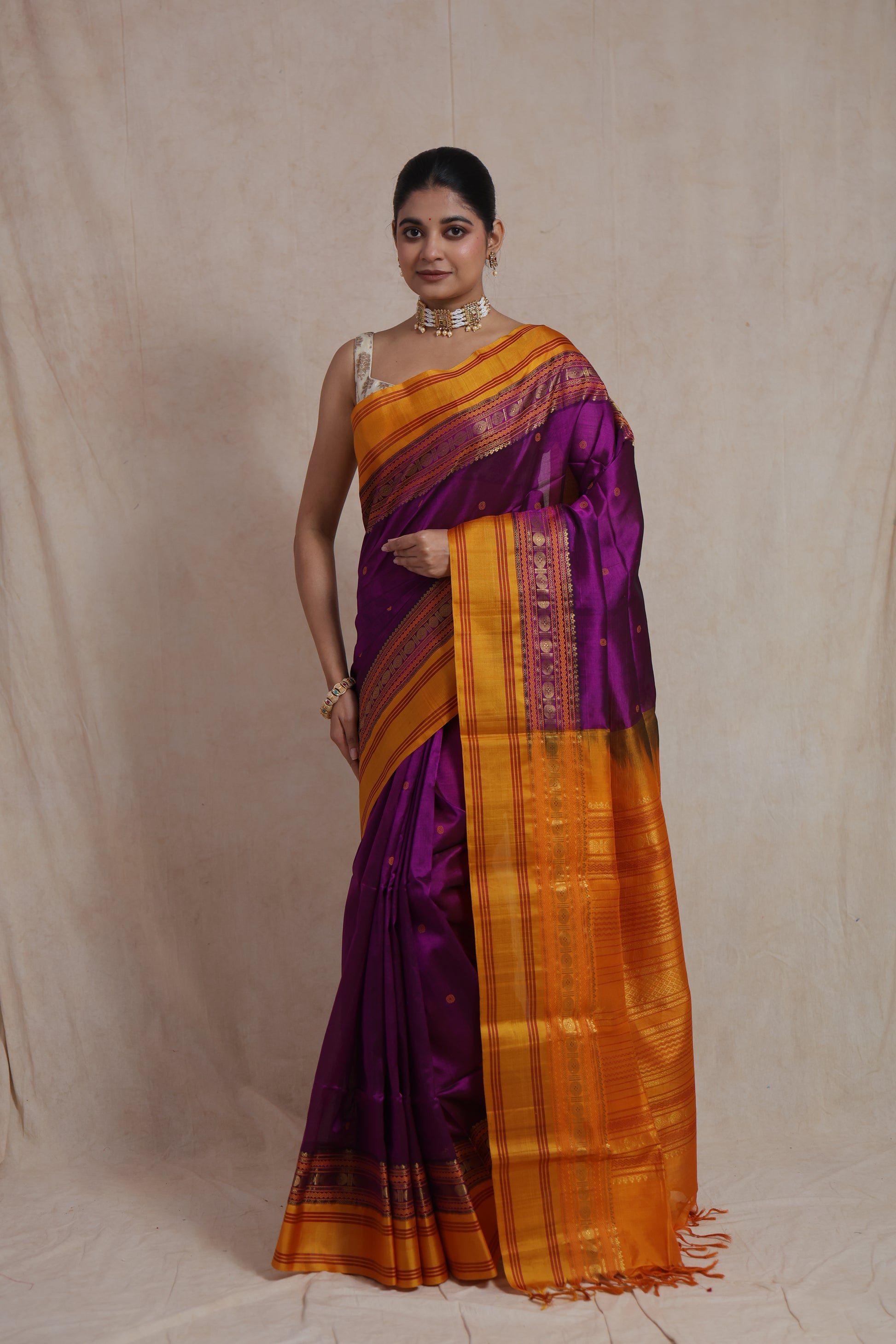 Front view of royal purple Kanchipuram Sico saree with rich woven pallu