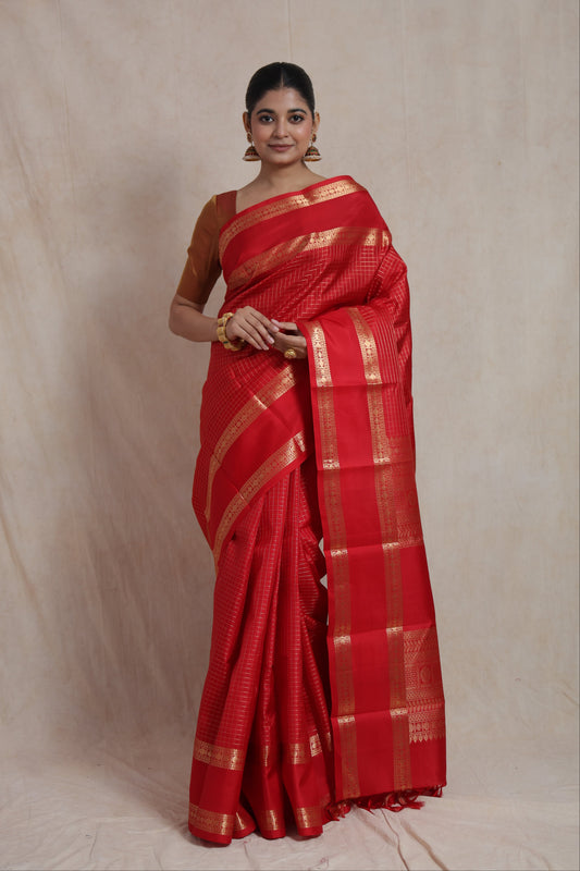 Front view of royal crimson red Kanjivaram pure silk saree with elegant woven checks and heritage border
