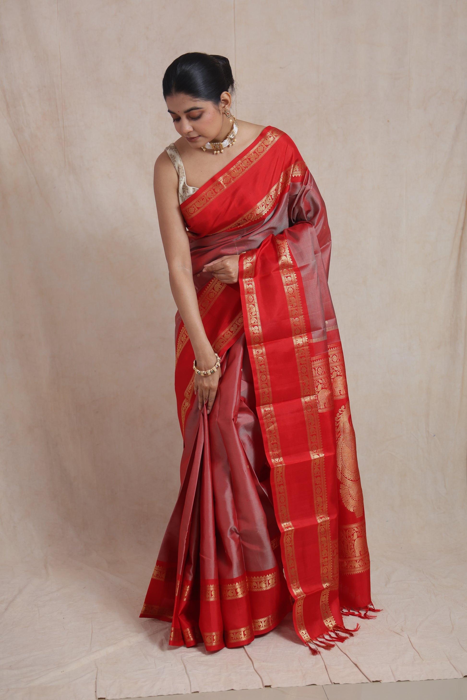 Front pose of royal red and grey Kanchiwaram silk saree
