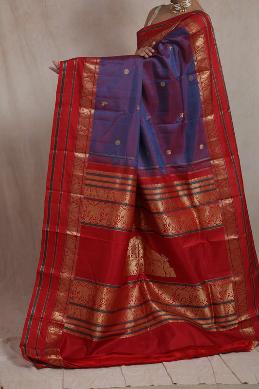 Royal violet Kanjivaram silk saree with grand red zari woven pallu