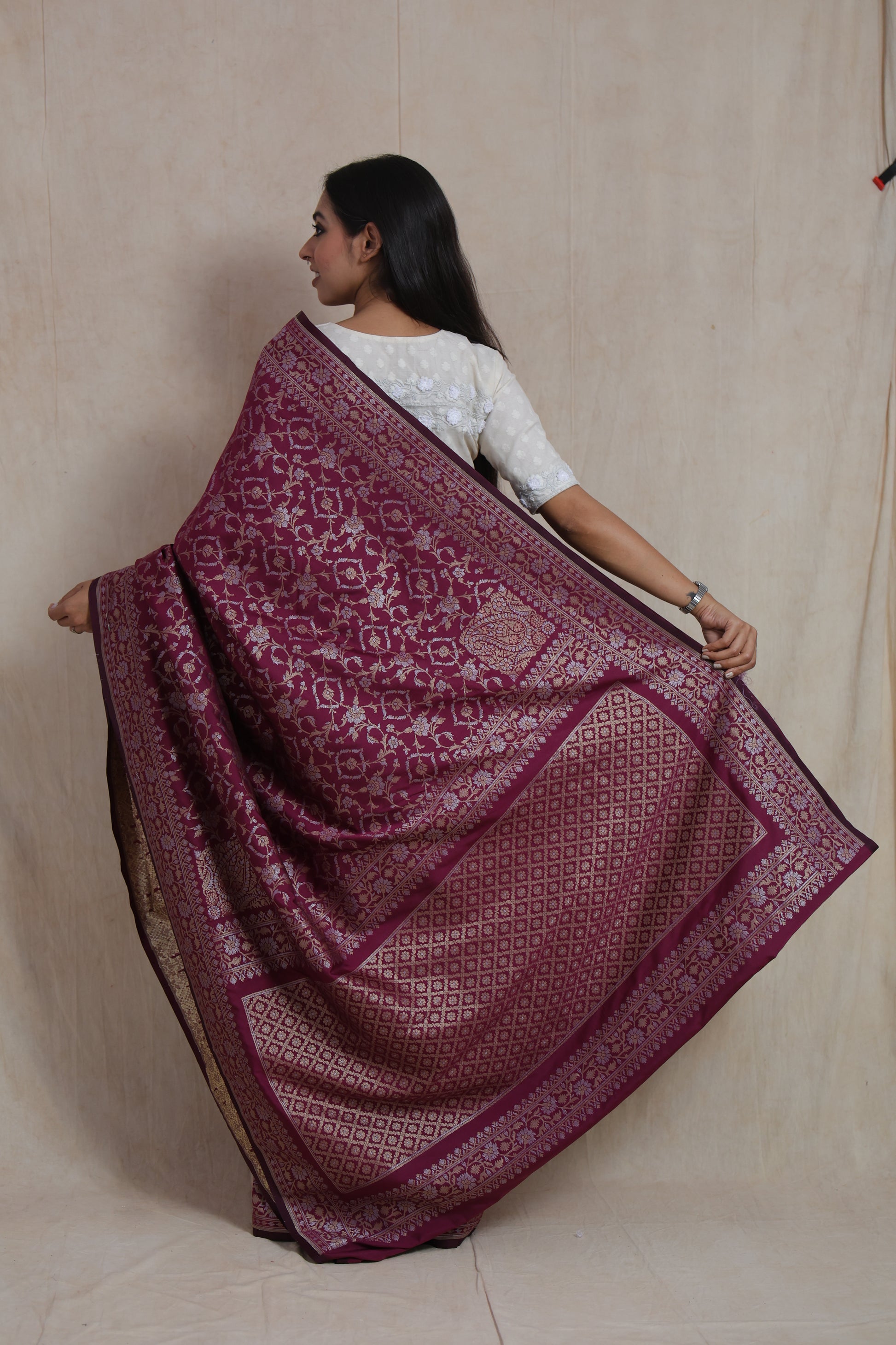 Back view of royal wine Banarasi art silk saree with rich zari woven pallu