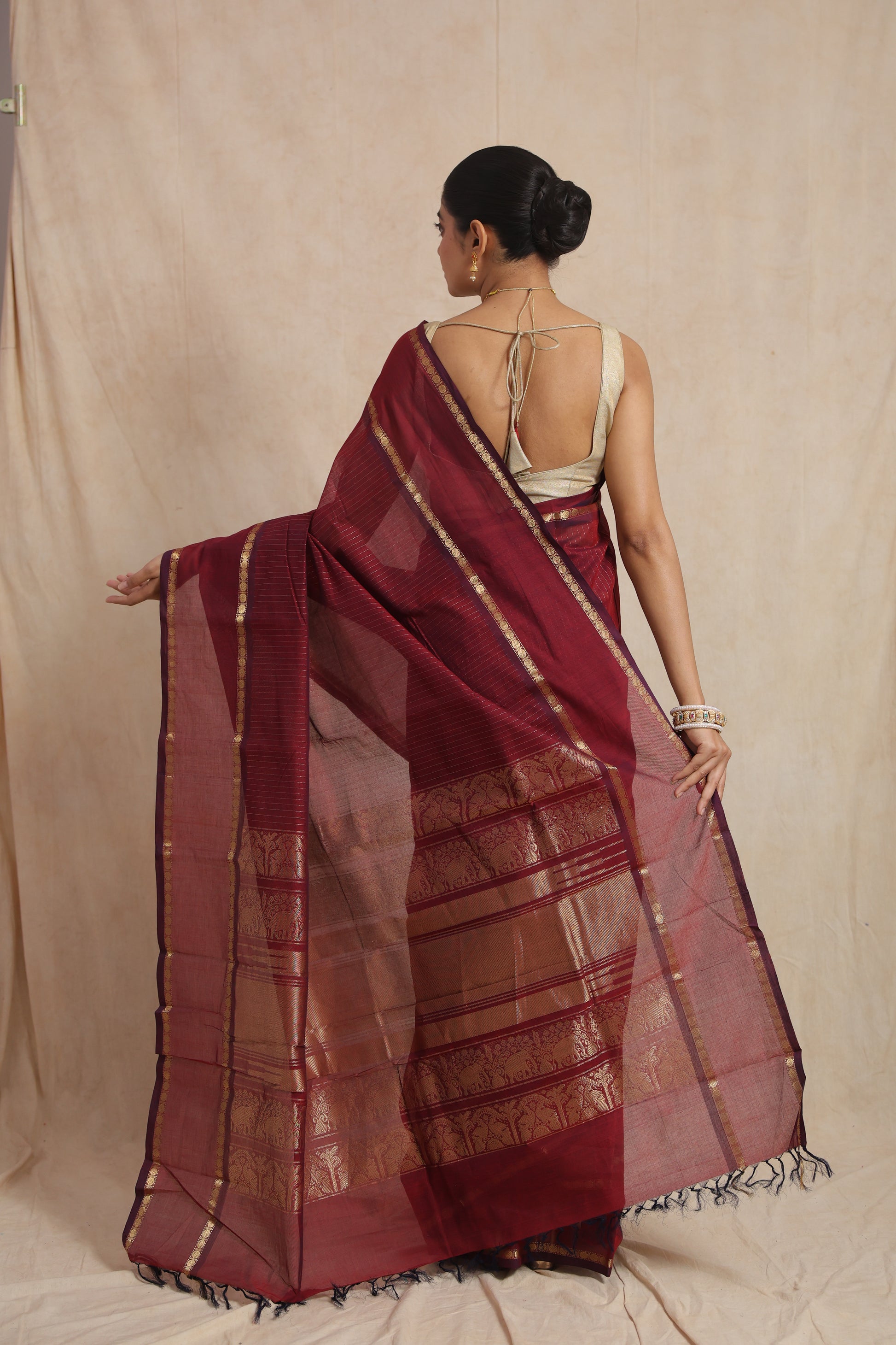 Back view of ruby red Kanchipuram cotton saree pallu