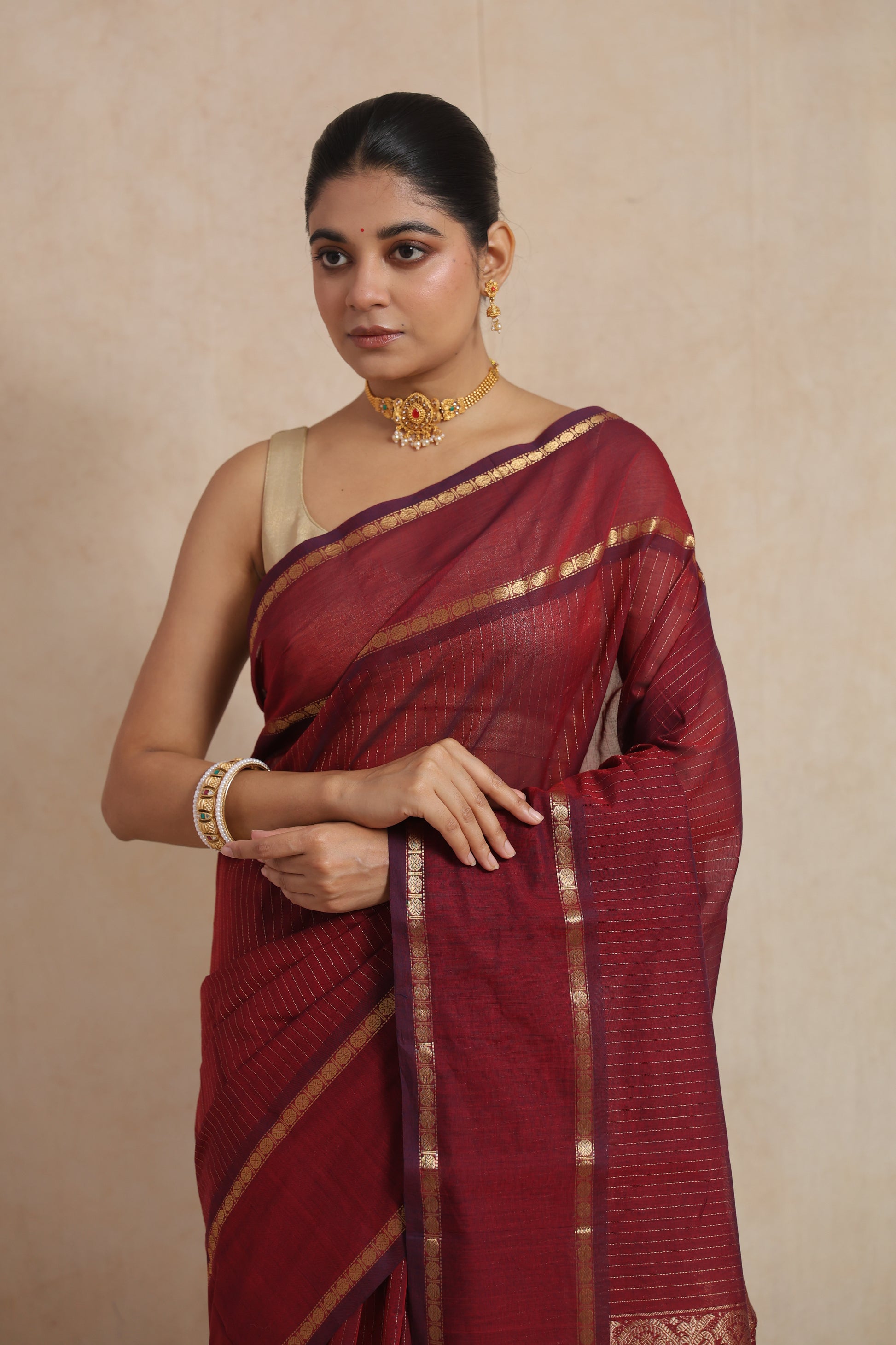 Elegant look in ruby red Kanchipuram cotton saree