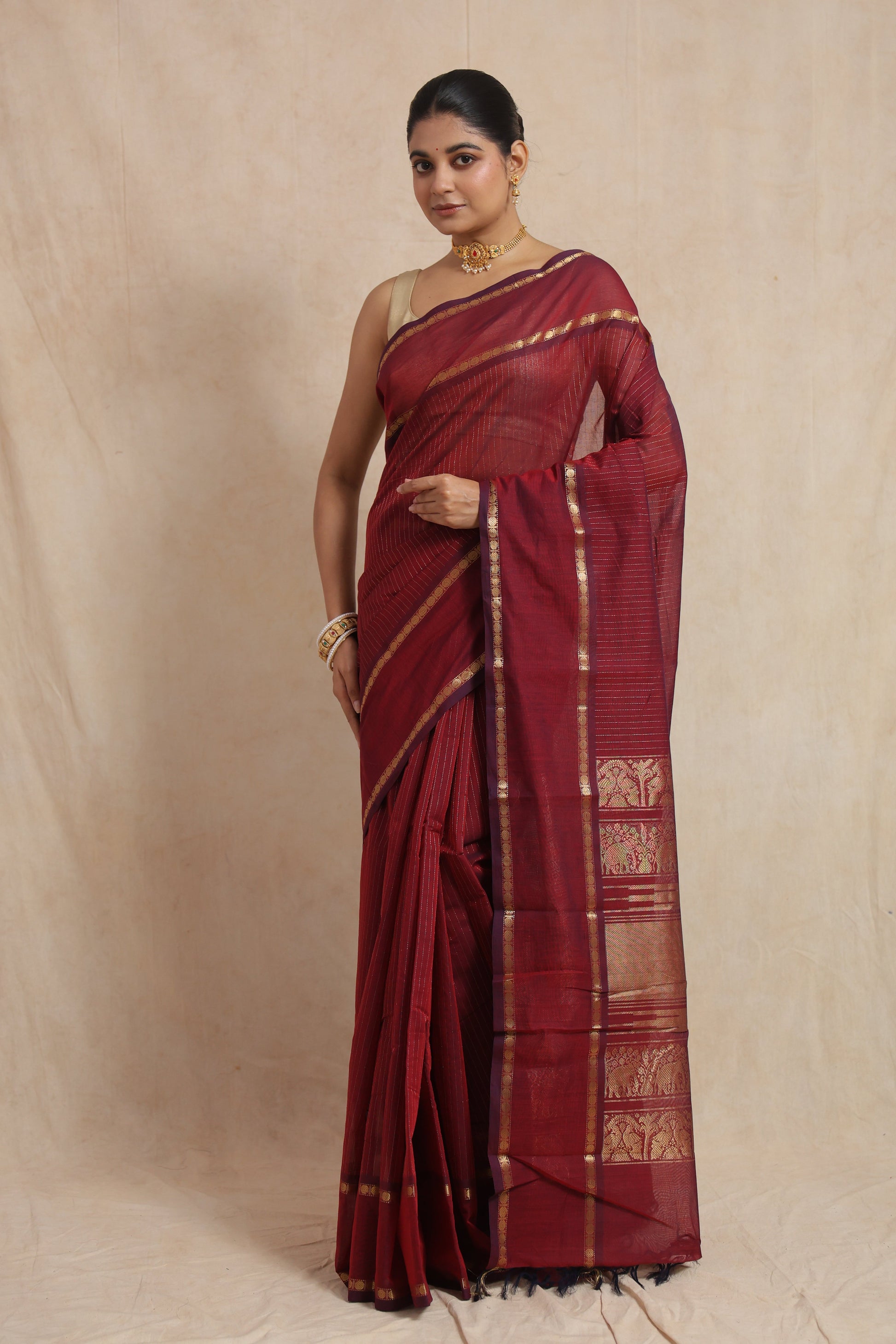 Front view of ruby red Kanchipuram cotton saree