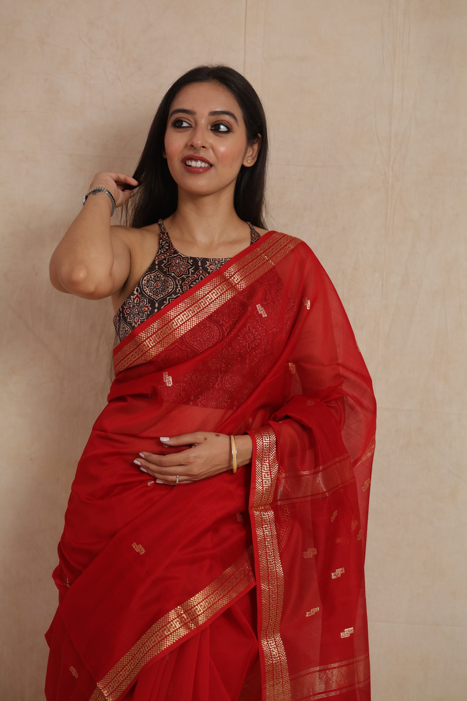Portrait styling in ruby red Maheshwari Sico saree